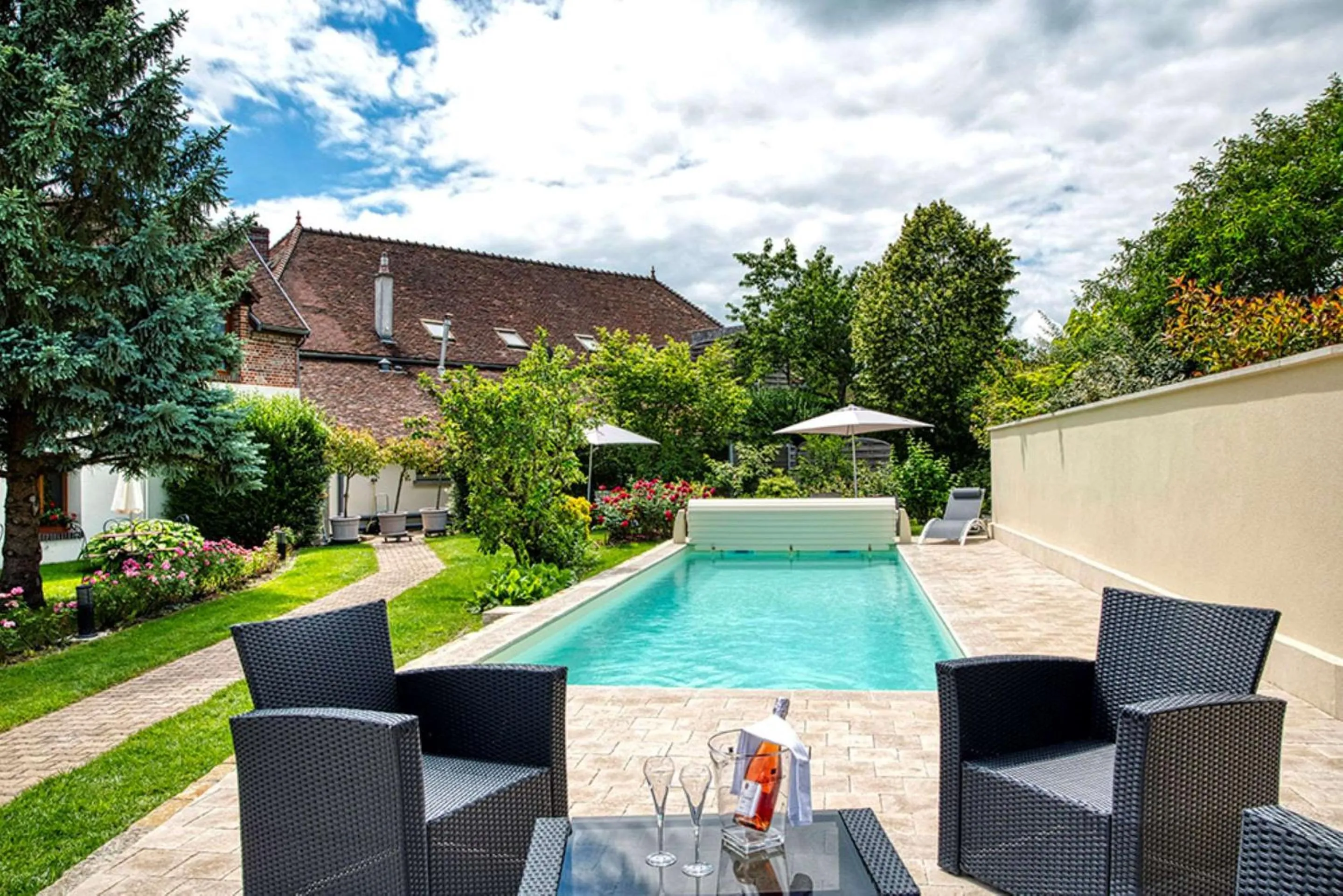 Pool view in Auberge du Lac, Sure Hotel Collection by Best Western