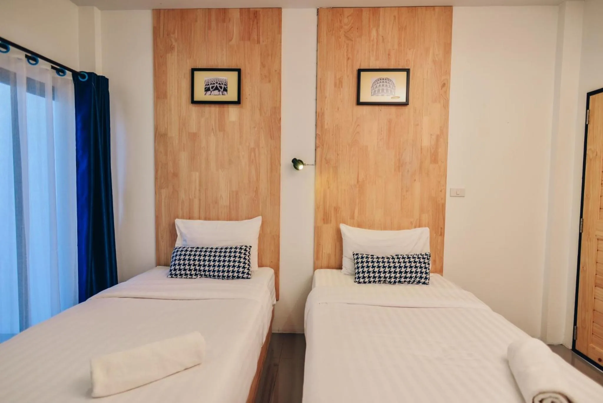 Bed in The Cozy Hotel