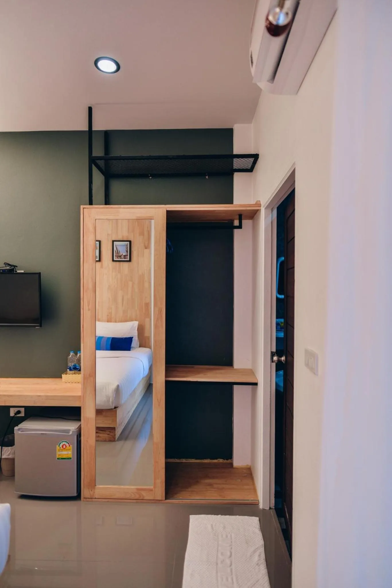 Bed in The Cozy Hotel