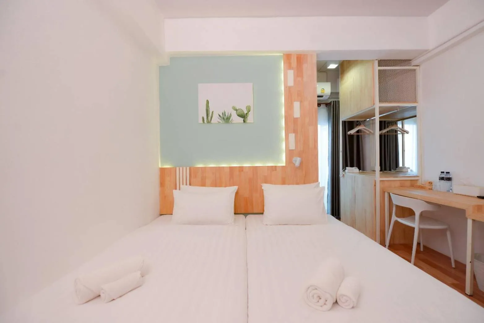 Bed in The Cozy Hotel