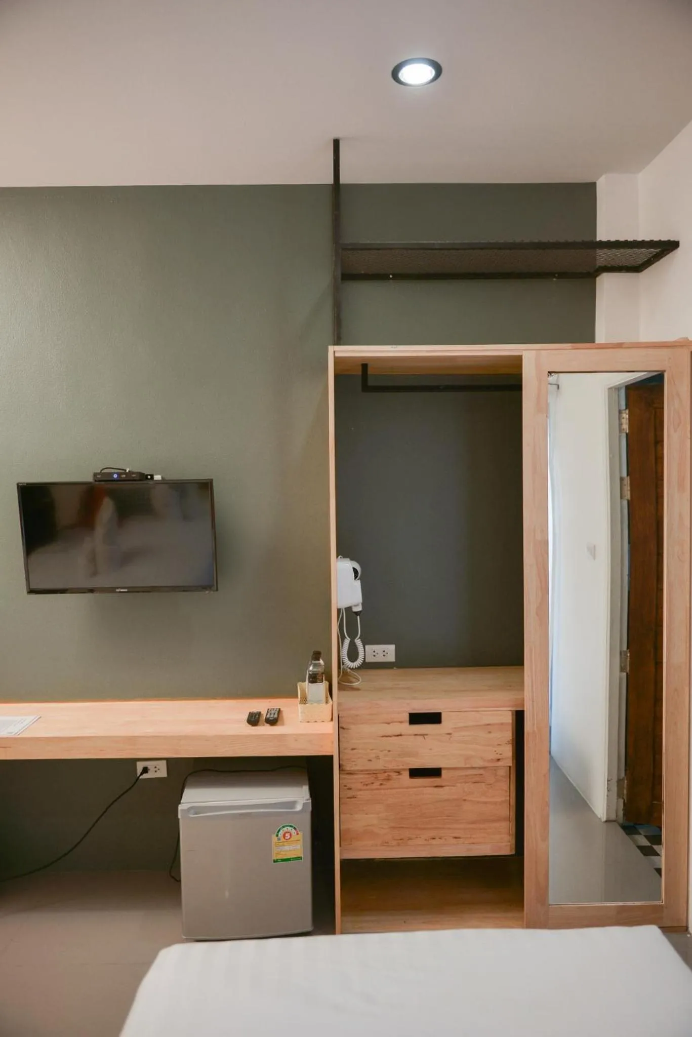 Bed in The Cozy Hotel