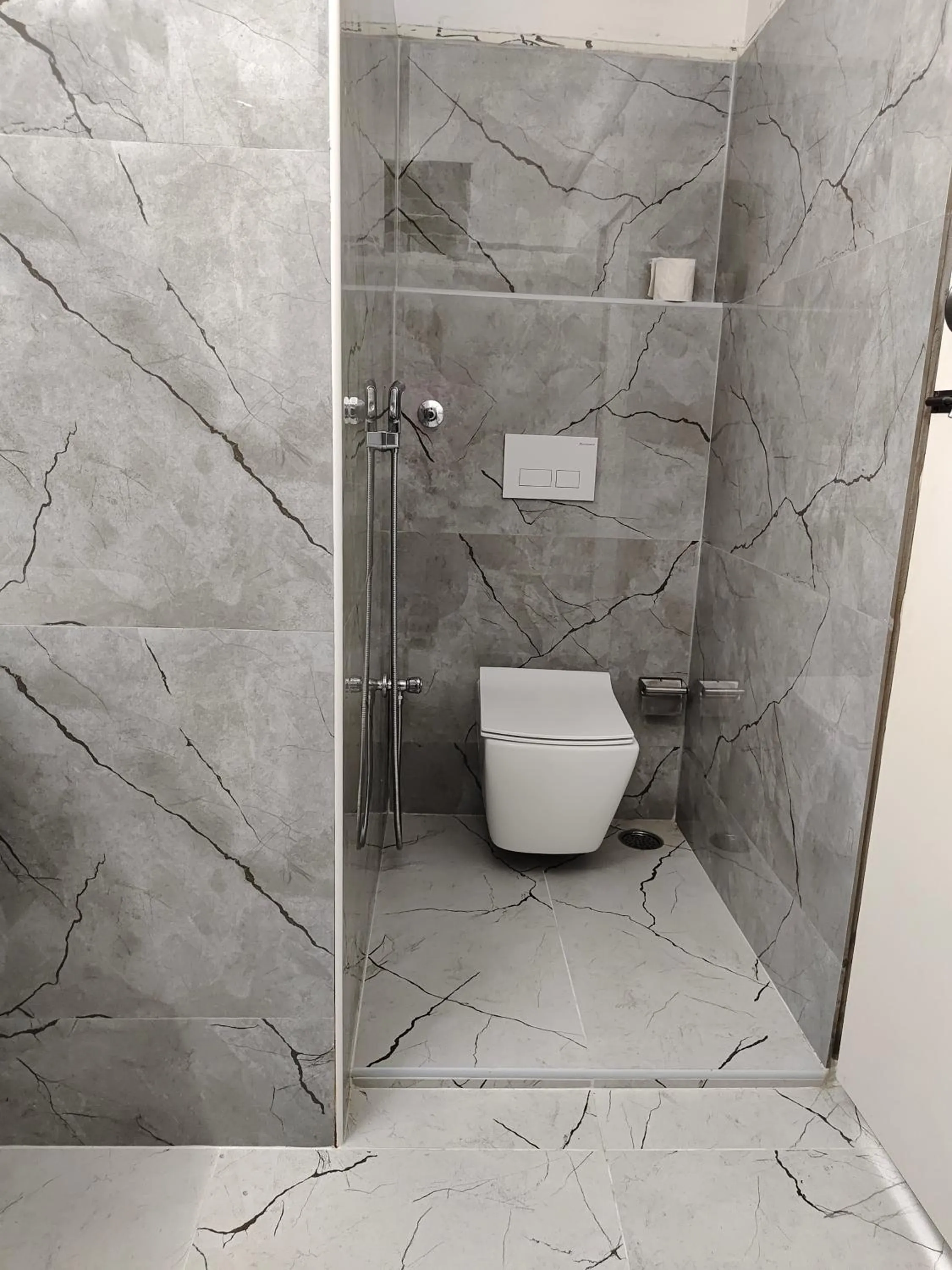 Toilet in Zingle Stay Airport Hotel