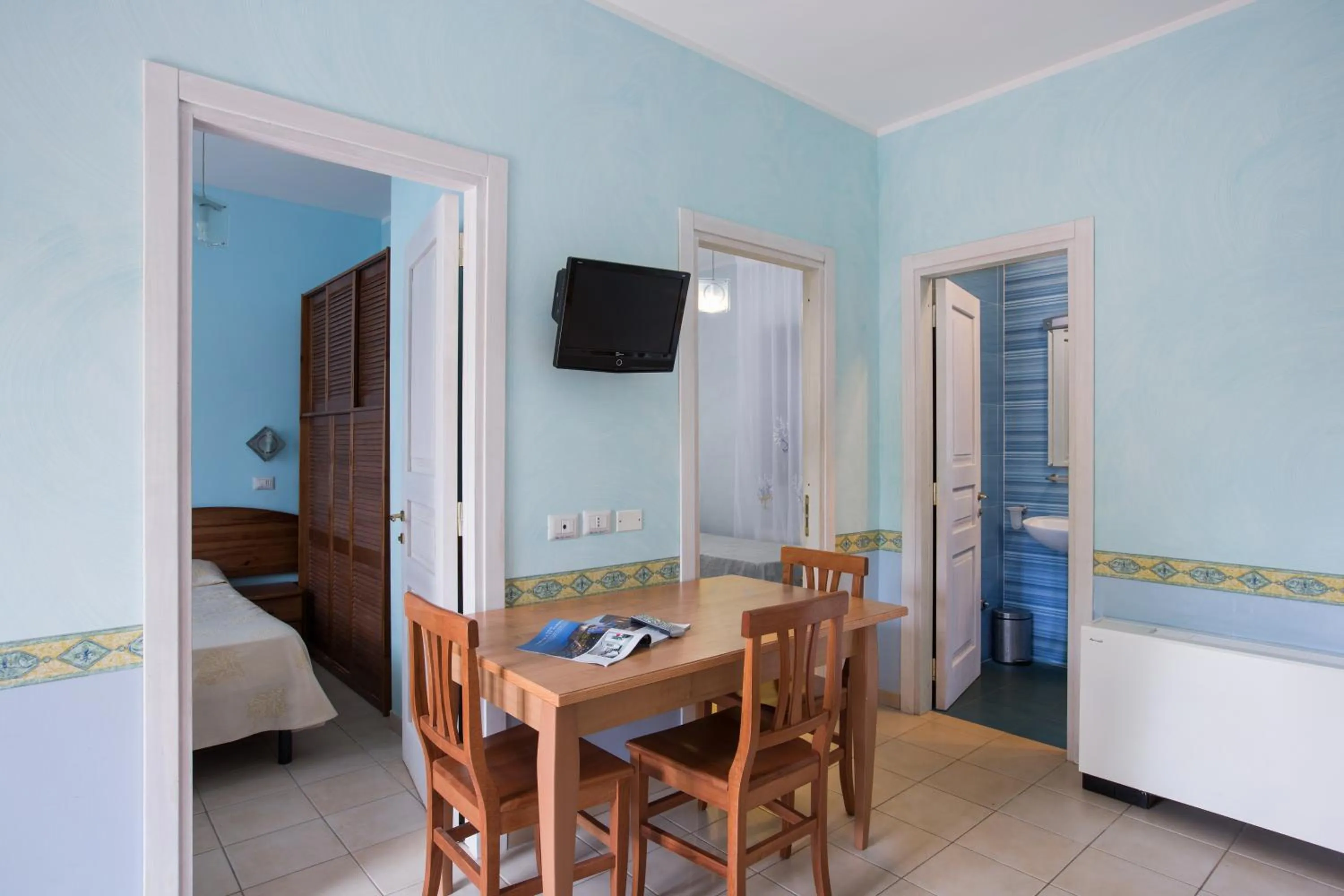 Living room, Bed in Village Baia Turchese