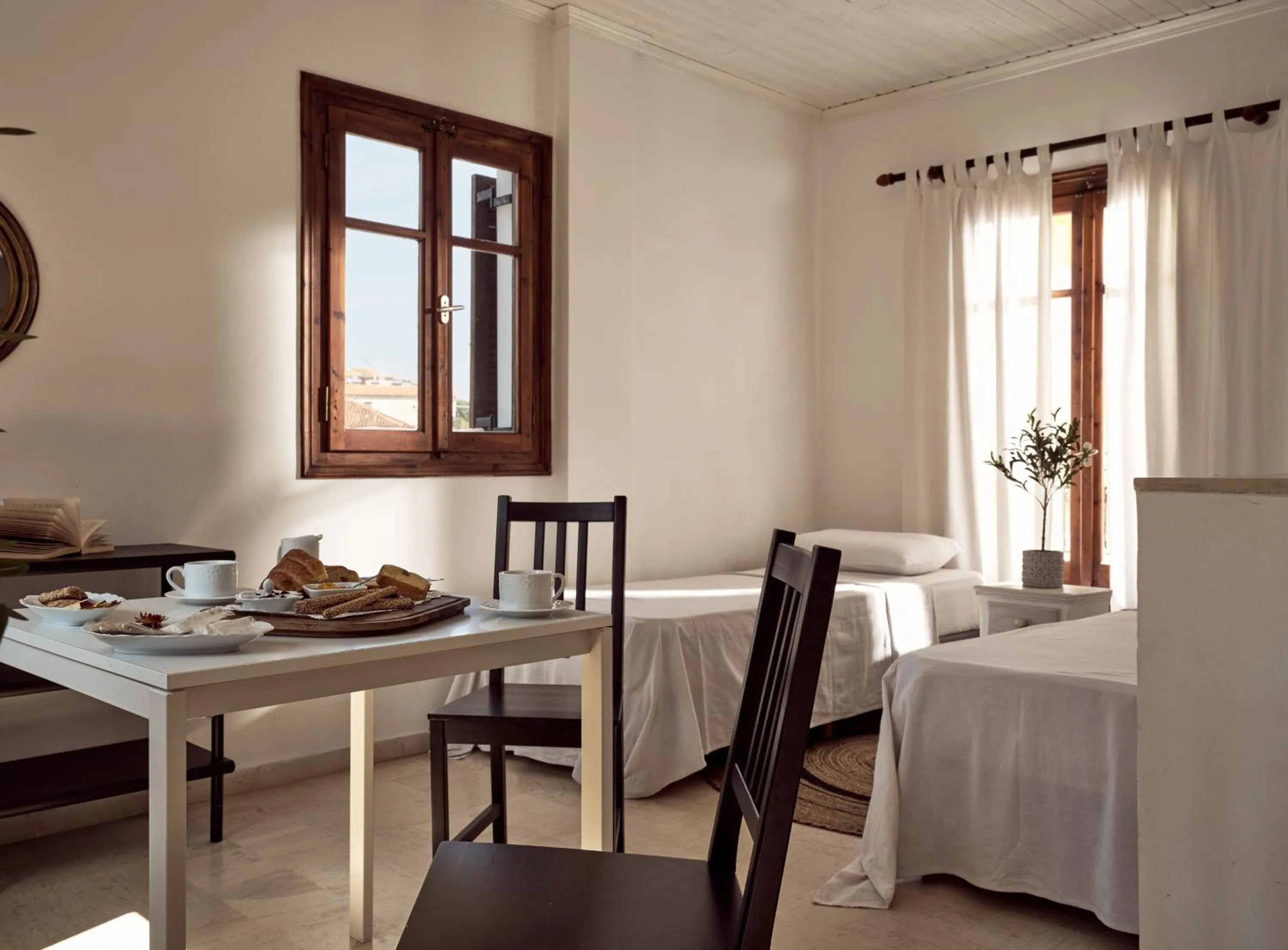 Bed in Razis Apartments