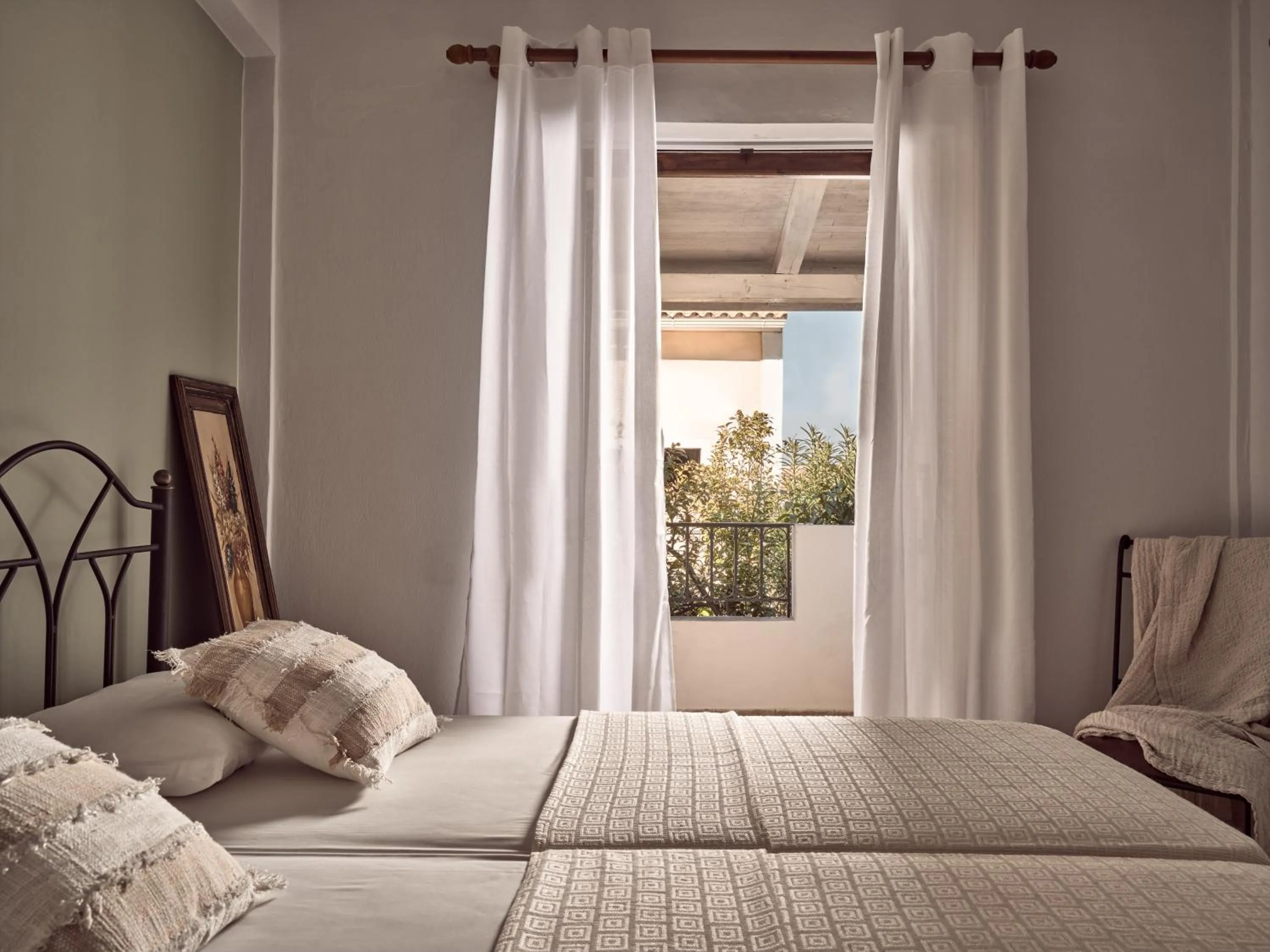 Bed in Razis Apartments