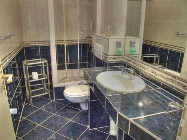 Bathroom in Vogel Hotel & Appartements