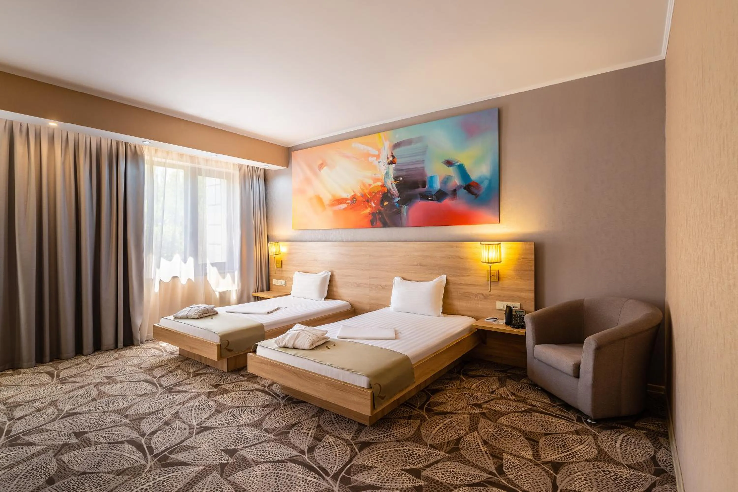 Bed in Renion Park Hotel