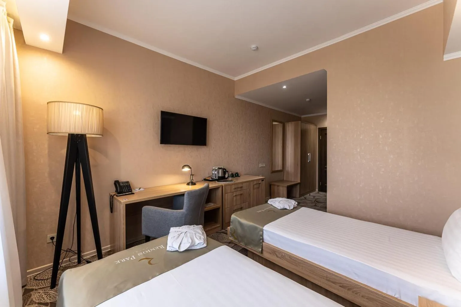 Bed in Renion Park Hotel