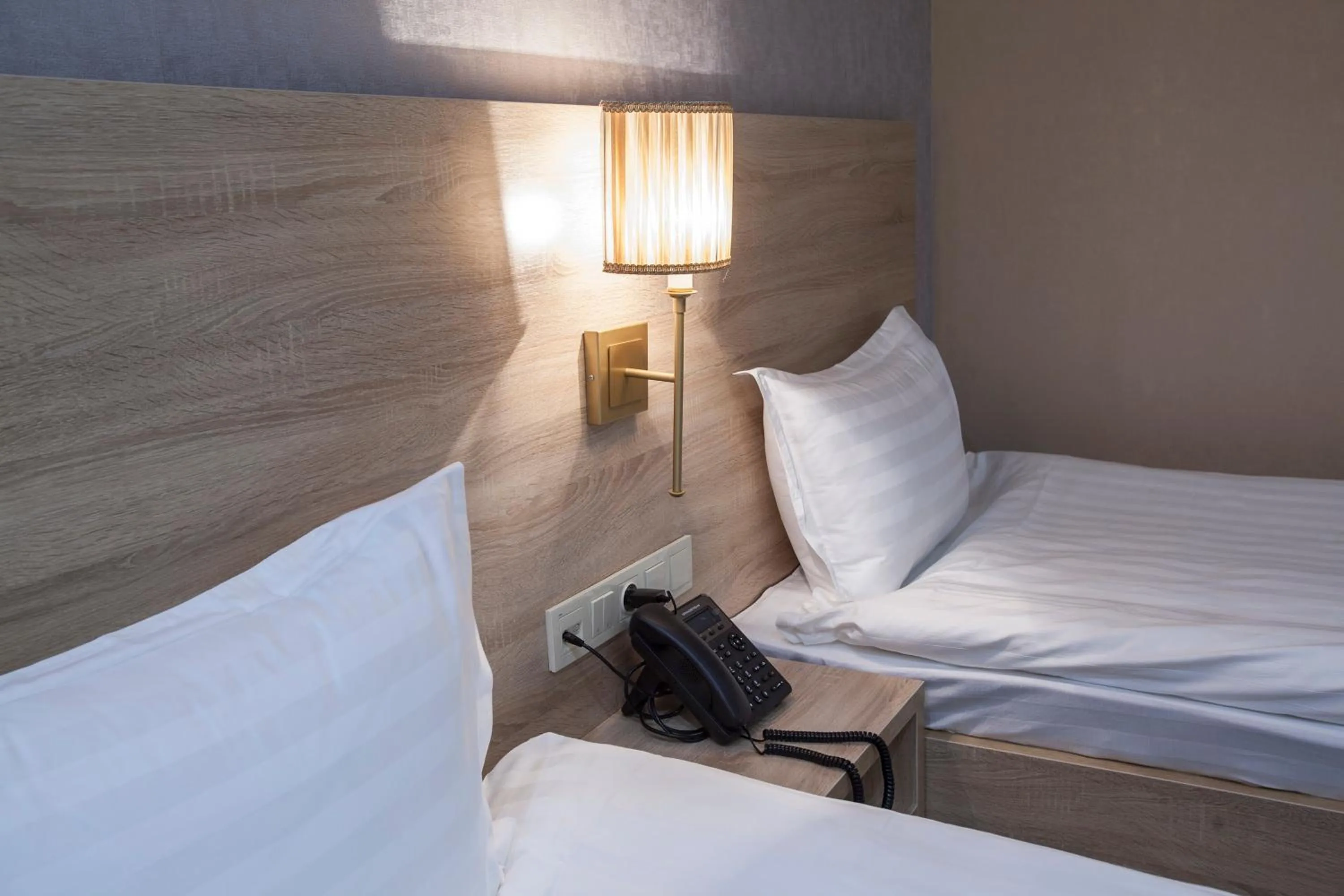 Bed in Renion Park Hotel