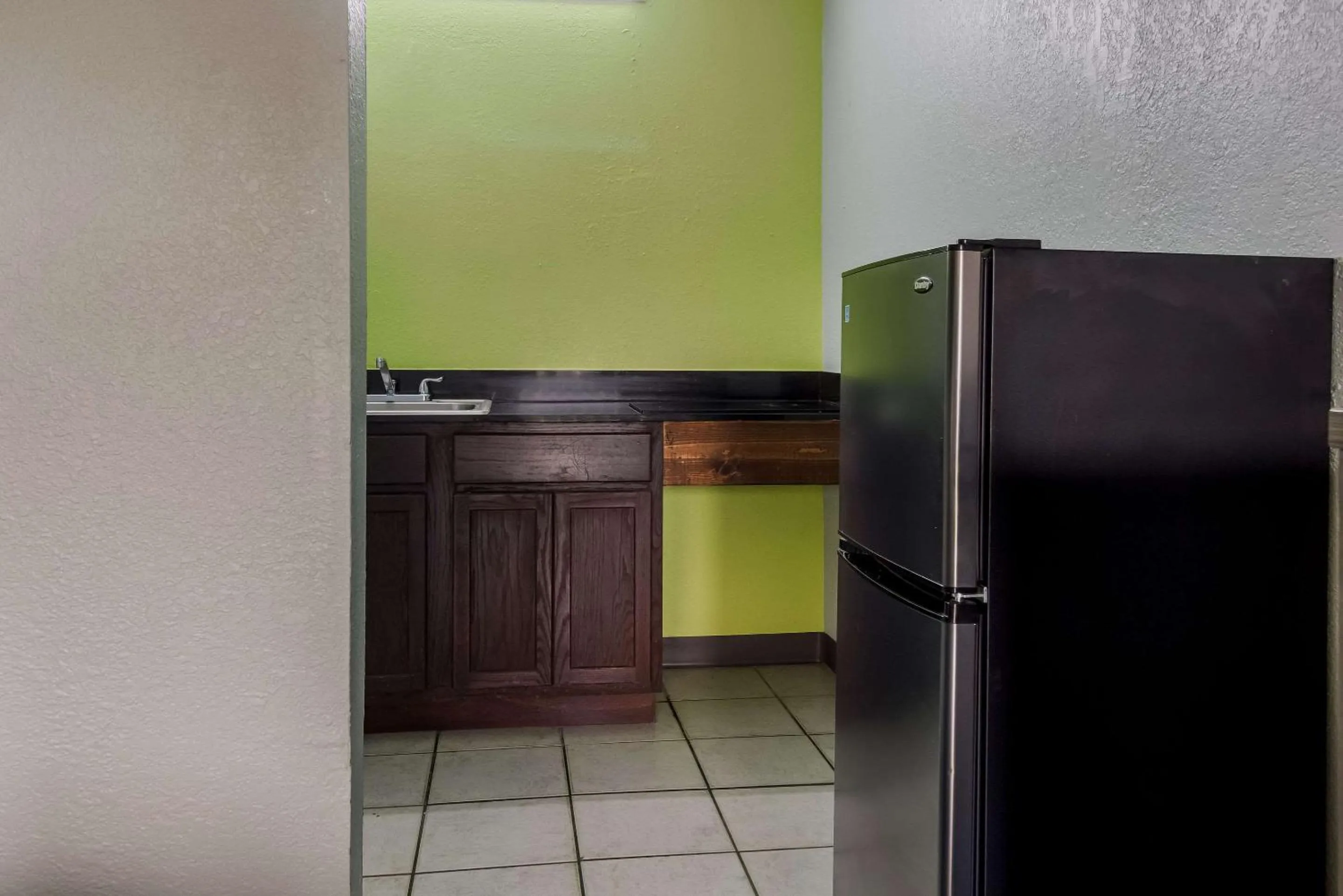 Bedroom in Rodeway Inn Conference Center