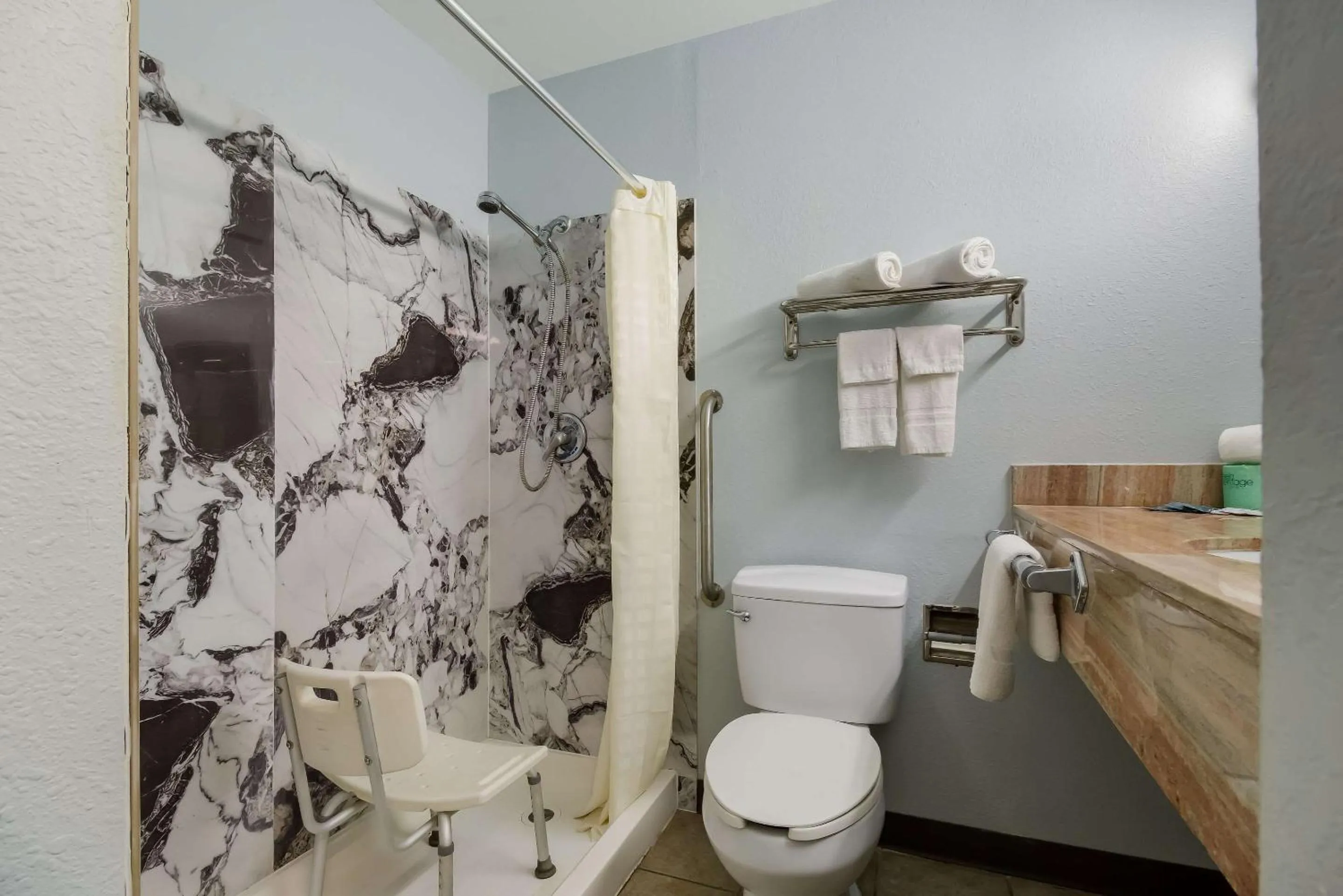 Bedroom in Rodeway Inn Conference Center