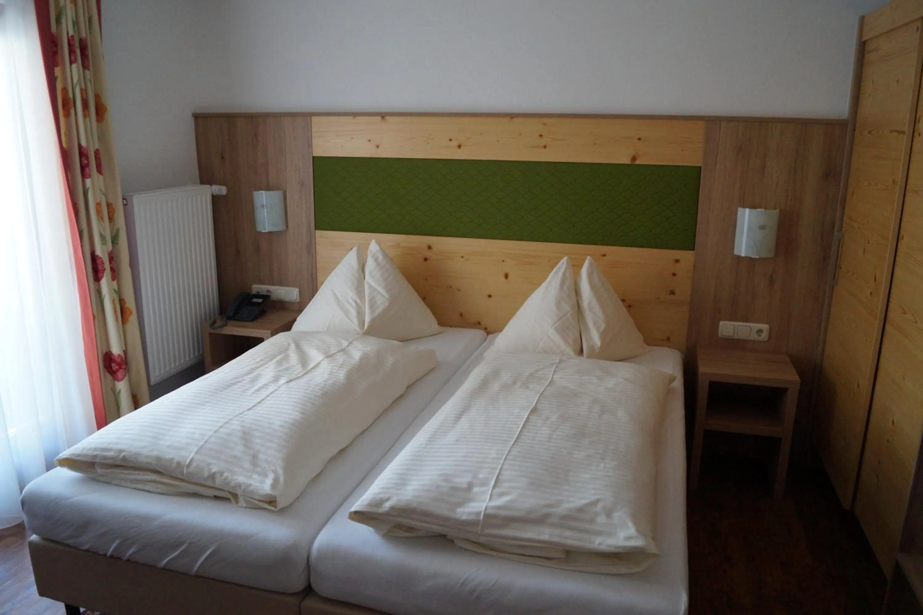 Photo of the whole room, Bed in Hotel Wechselberger by Alpeffect Hotels