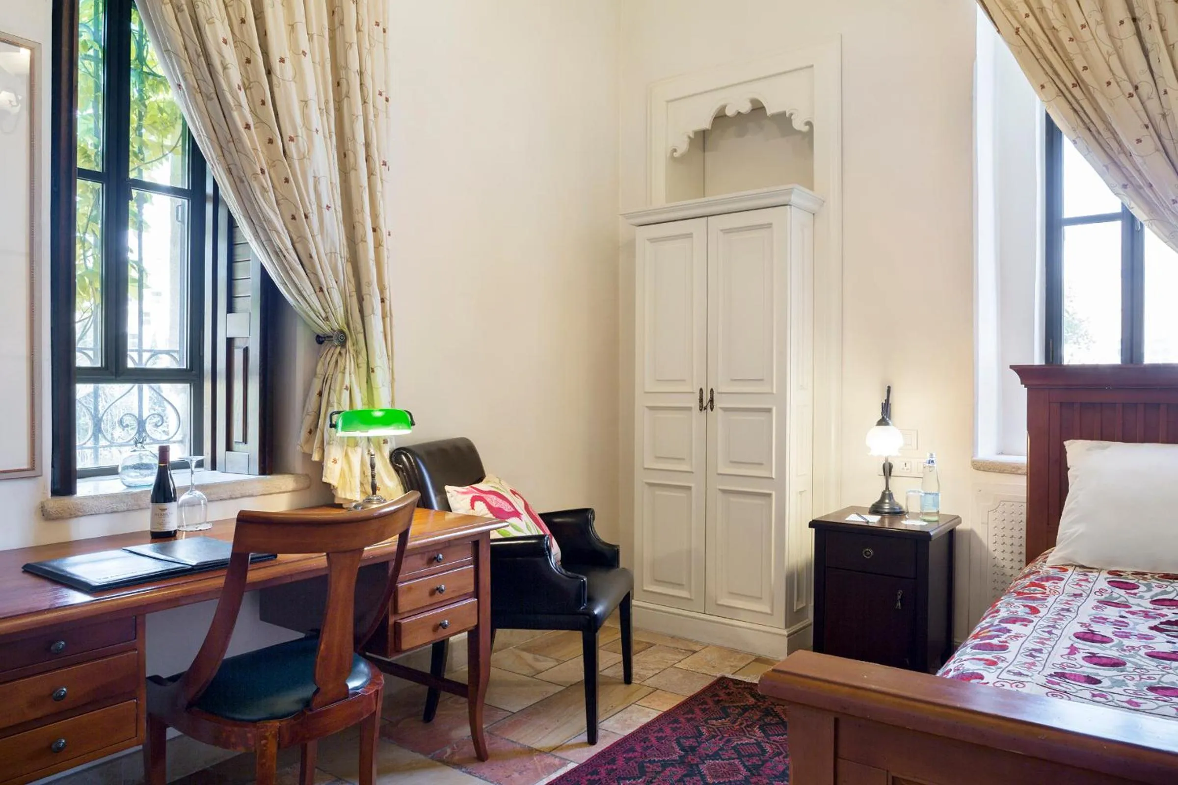 Seating area, Bed in The American Colony Hotel - Small Luxury Hotels of the World