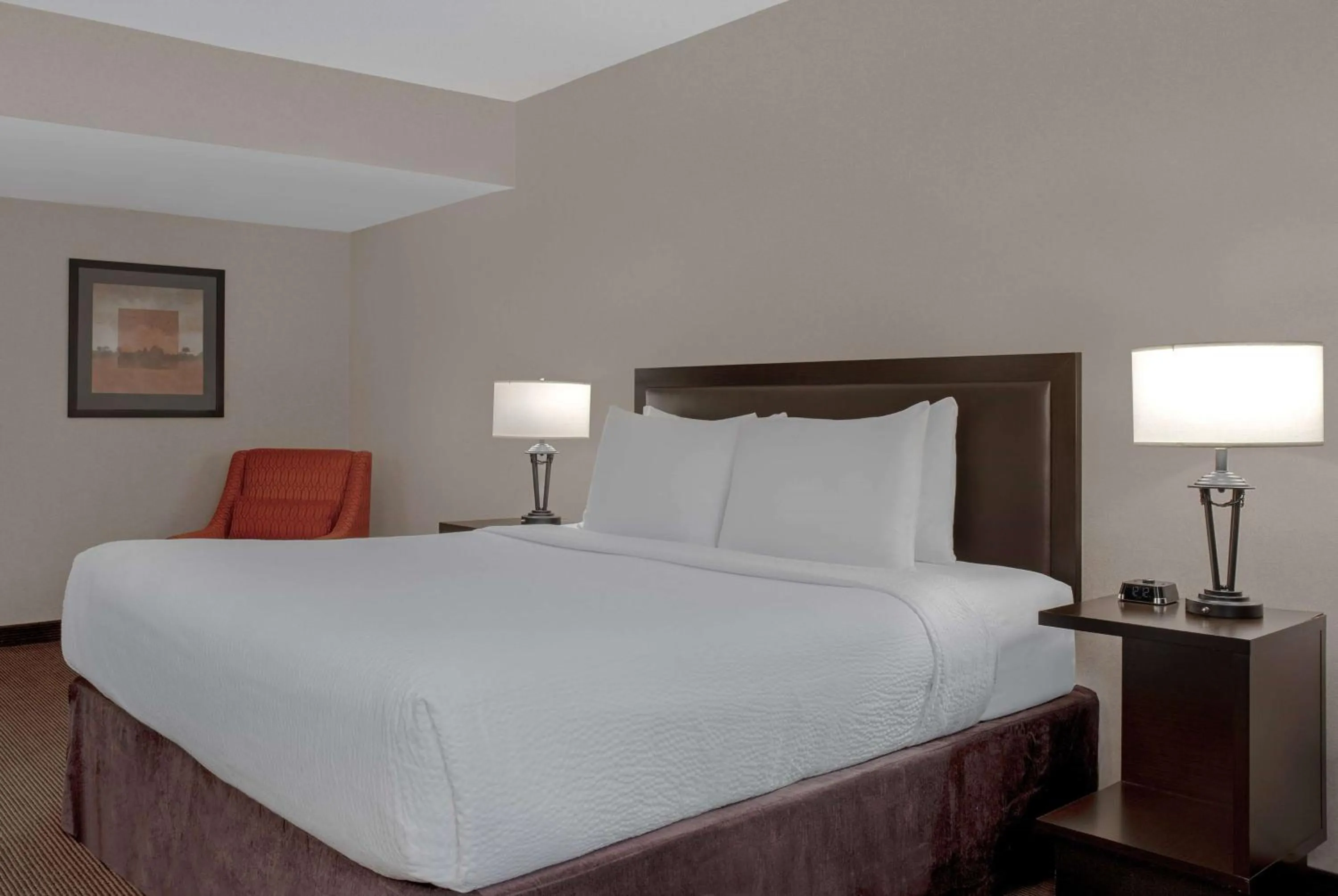 Photo of the whole room, Bed in Ramada Plaza by Wyndham Calgary Downtown