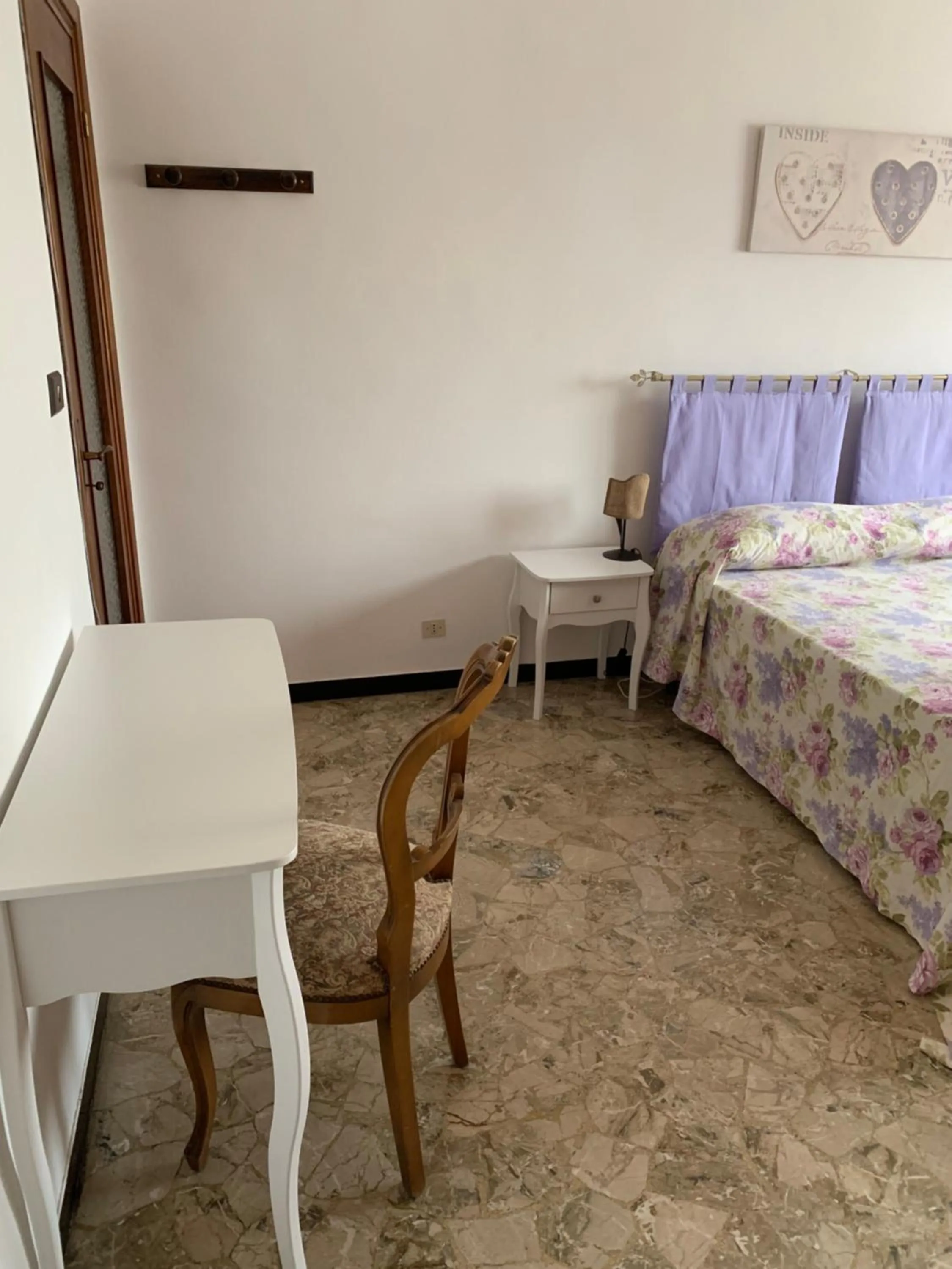 Bedroom in Affittacamere Serravalle Shopping