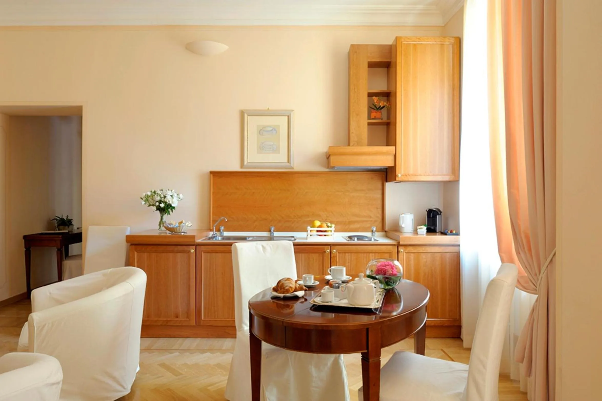 Kitchen or kitchenette in Dea Suite Roma