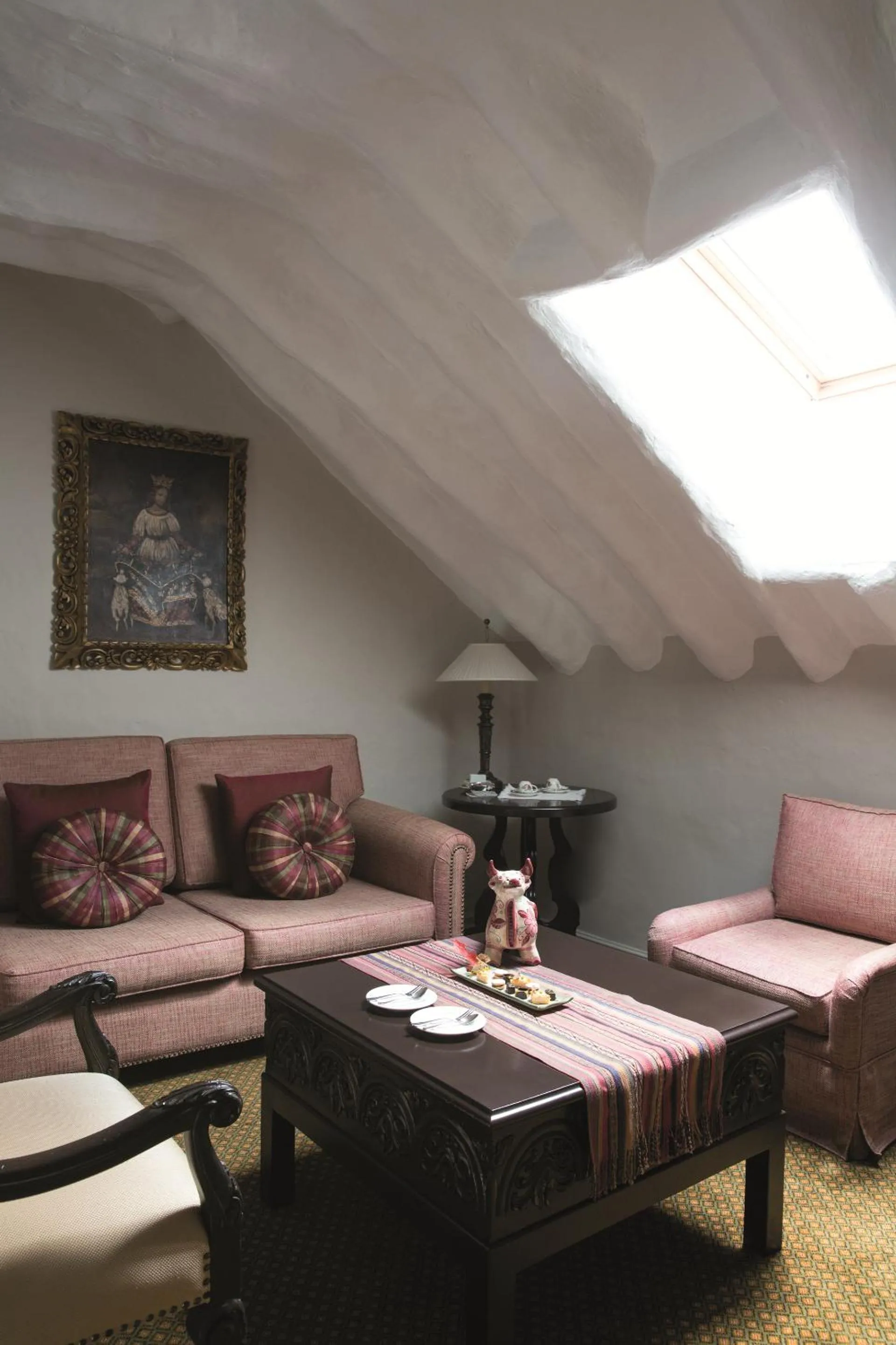 Seating area in Monasterio, A Belmond Hotel, Cusco