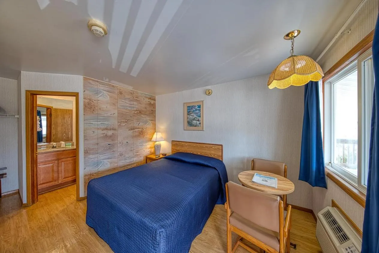 Bed in Sea Spray Motel