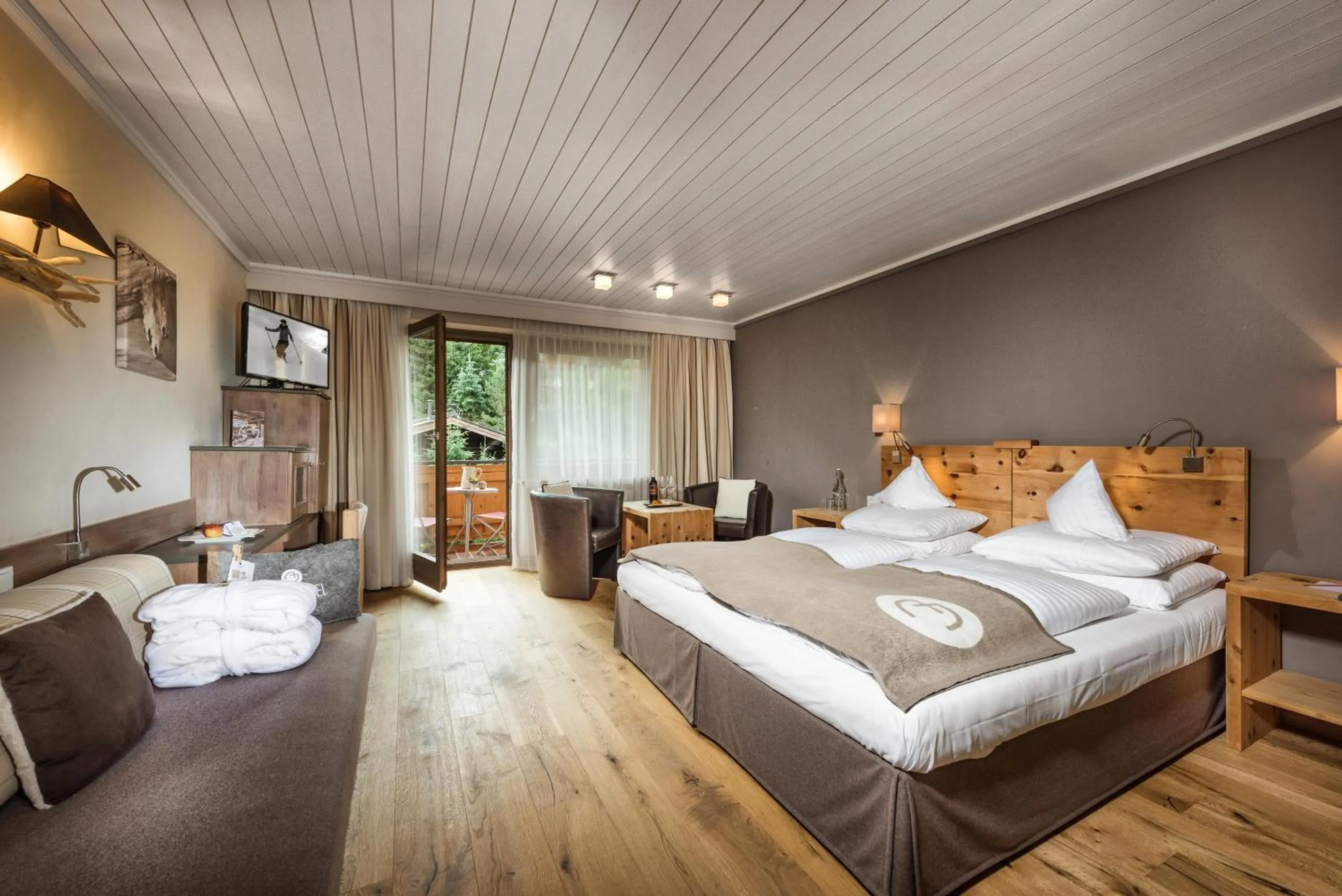 Living room, Bed in Alpin Juwel - Bio und Lifestylehotel