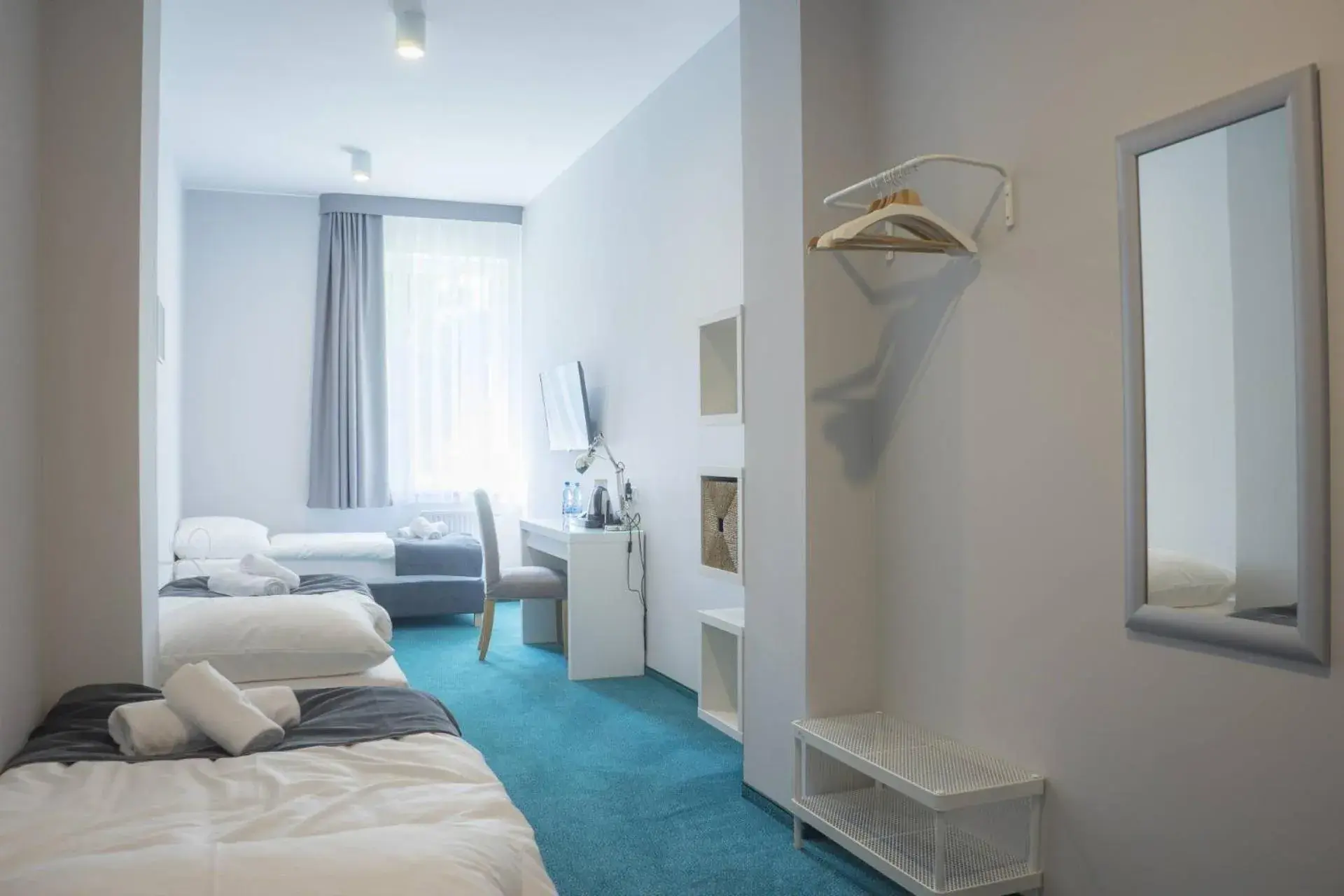 Triple Room in Hotel Inner City Triple Room in Hotel Inner City