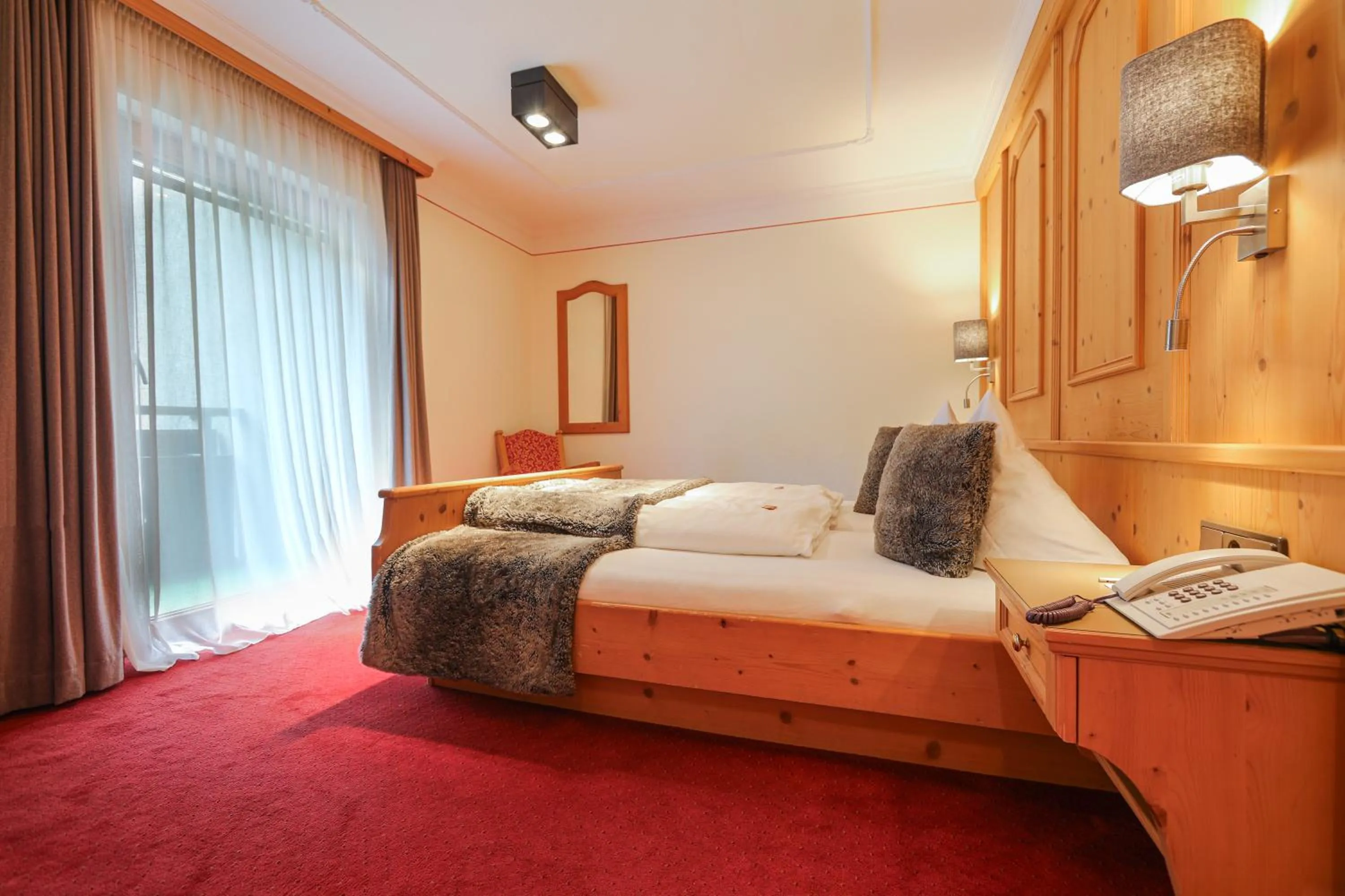 Bed in Chalet Madlein