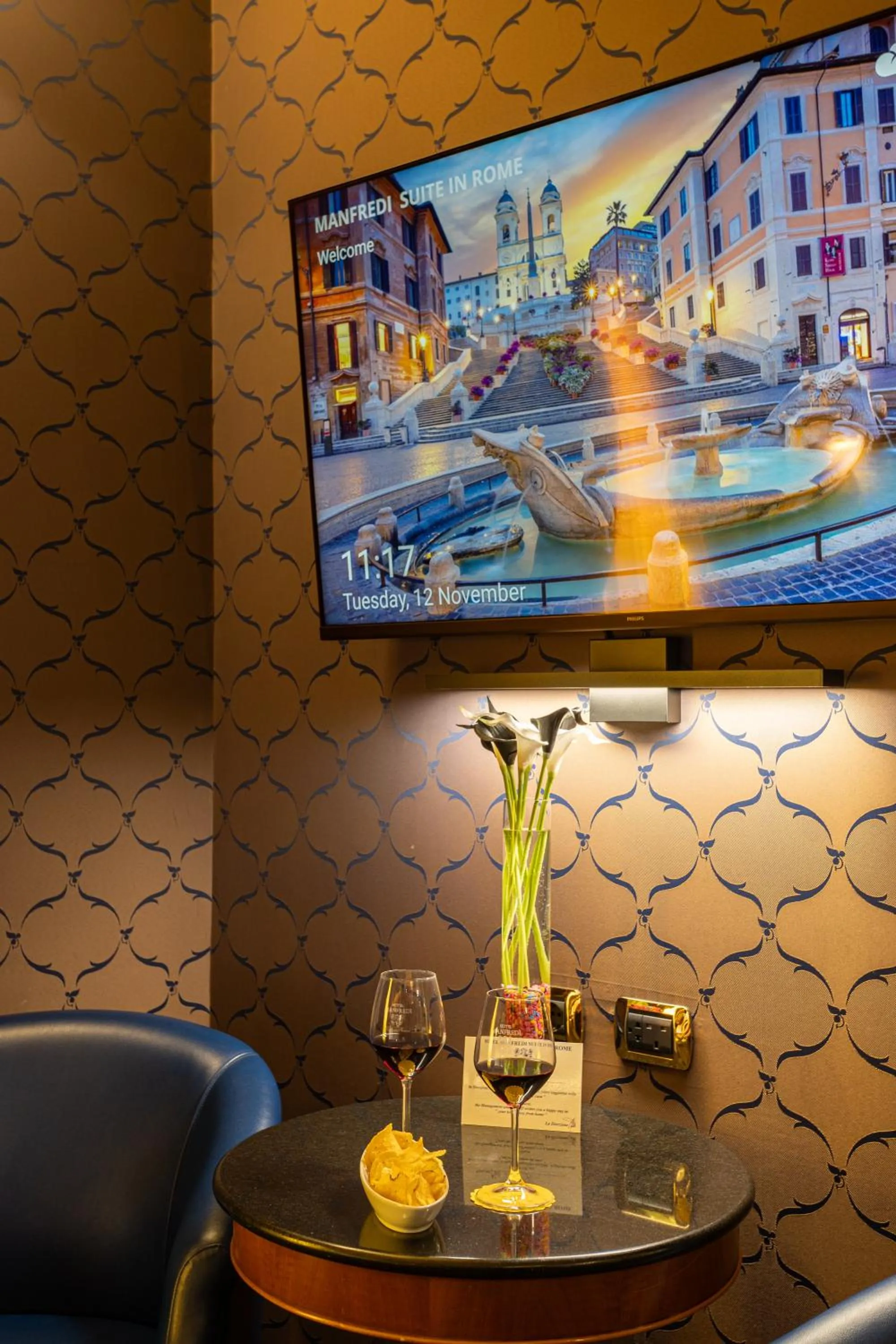 TV and multimedia in Hotel Manfredi Suite In Rome