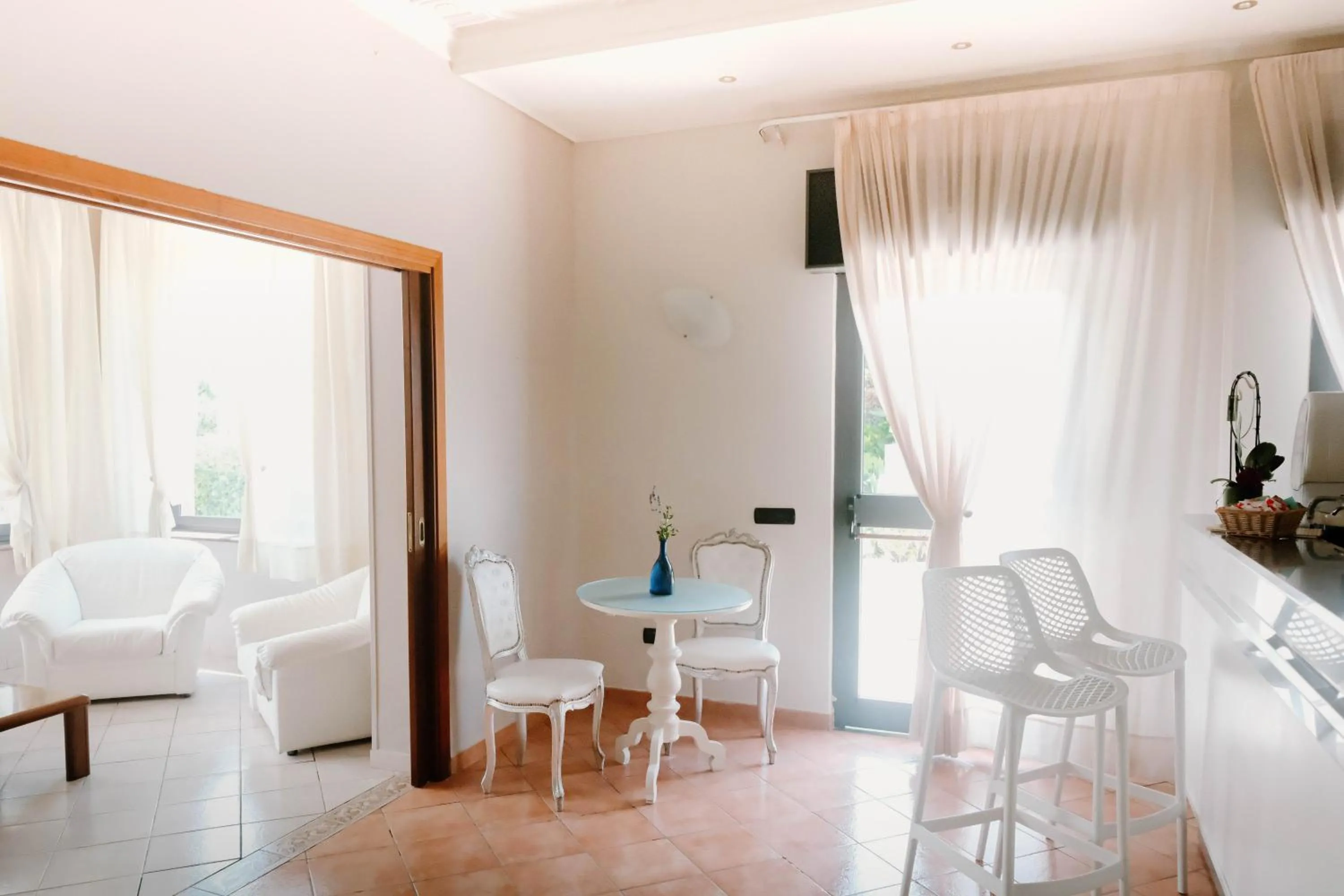 Communal lounge/ TV room in Beach Hotel Terracotta