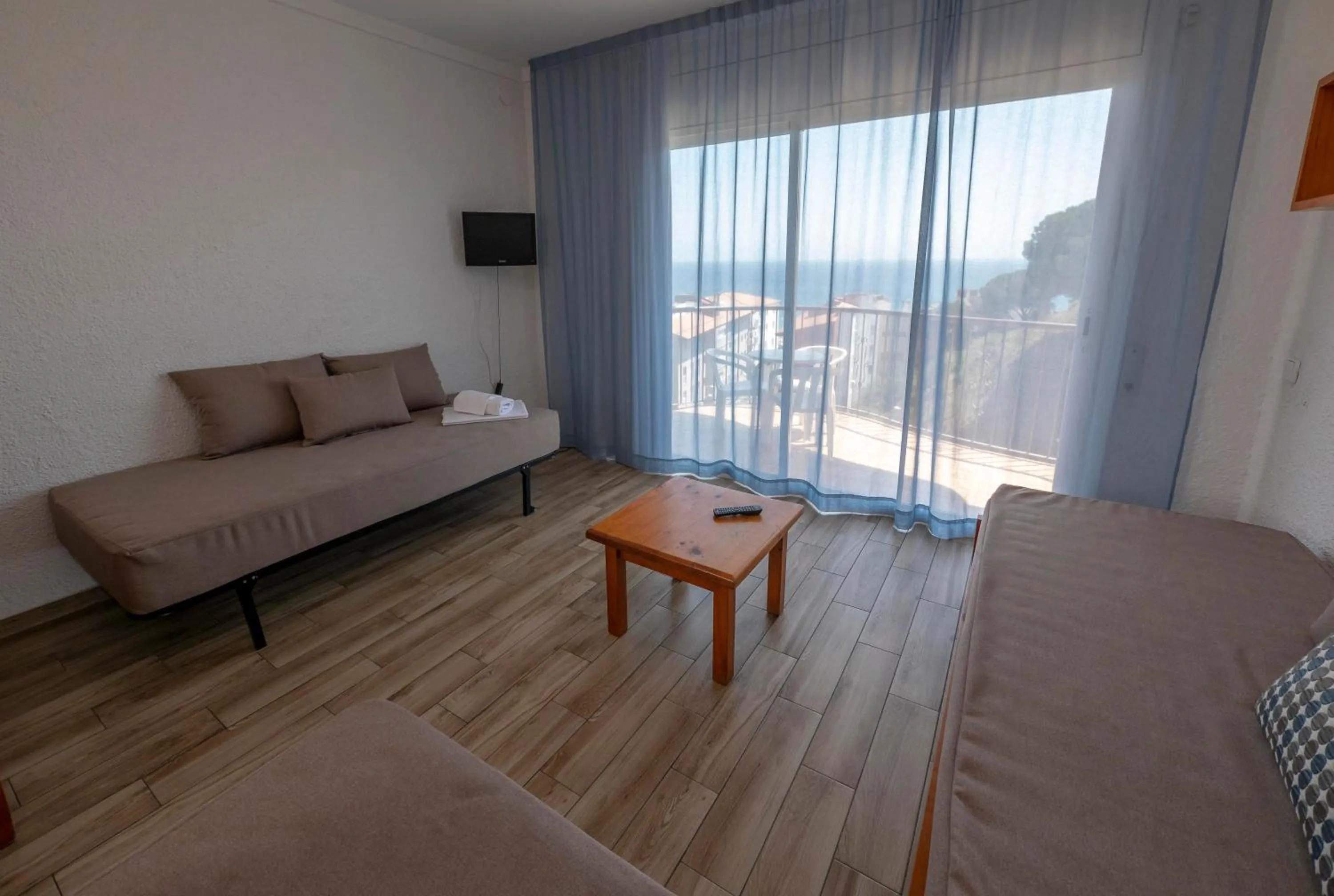 Seating area in Apartamentos AR Muntanya Mar