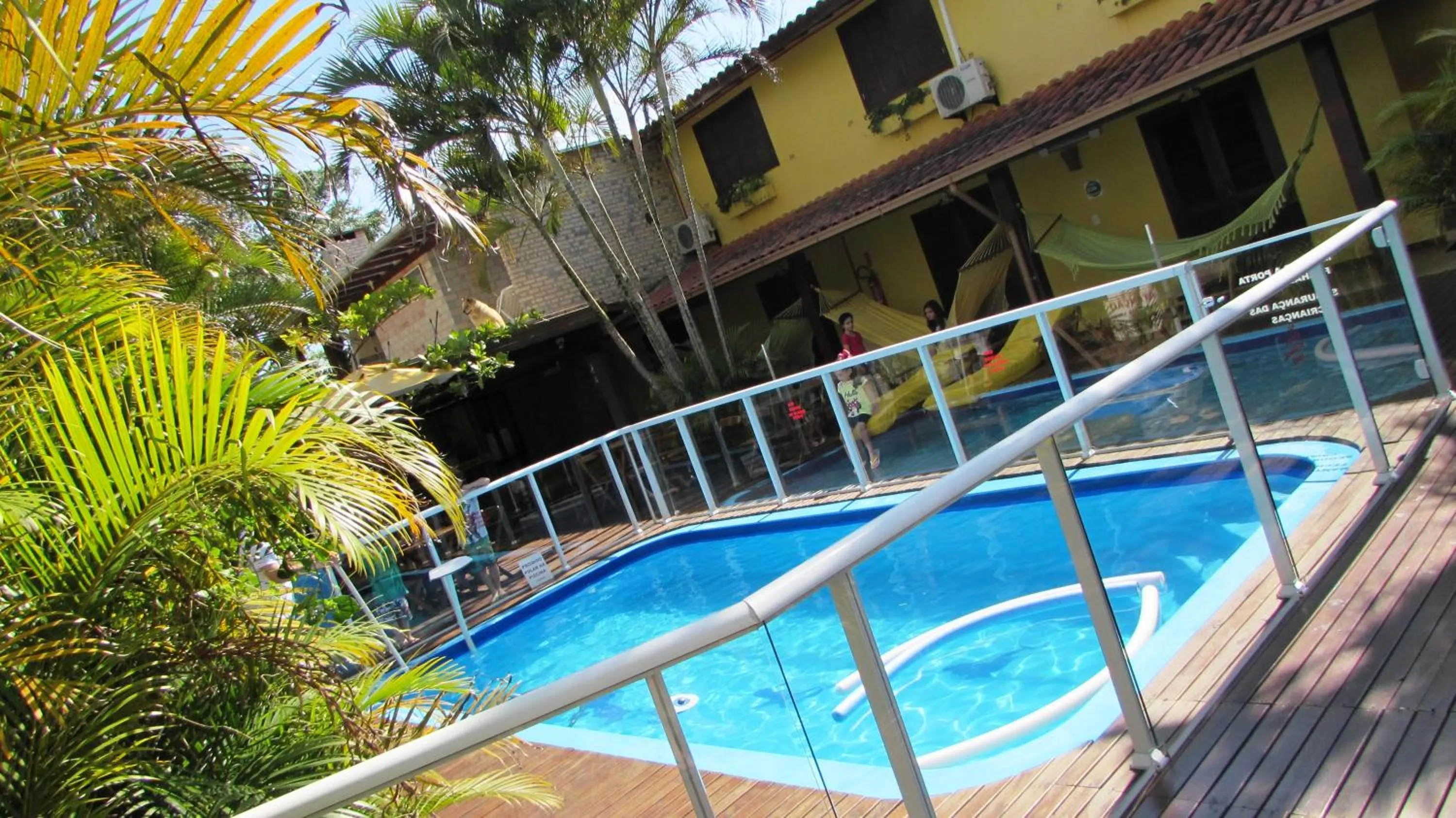 Swimming pool in Pousada Palhocinha Garopaba