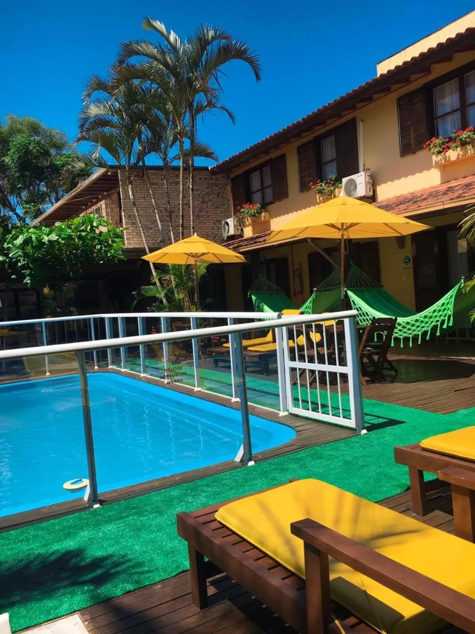 Swimming pool in Pousada Palhocinha Garopaba