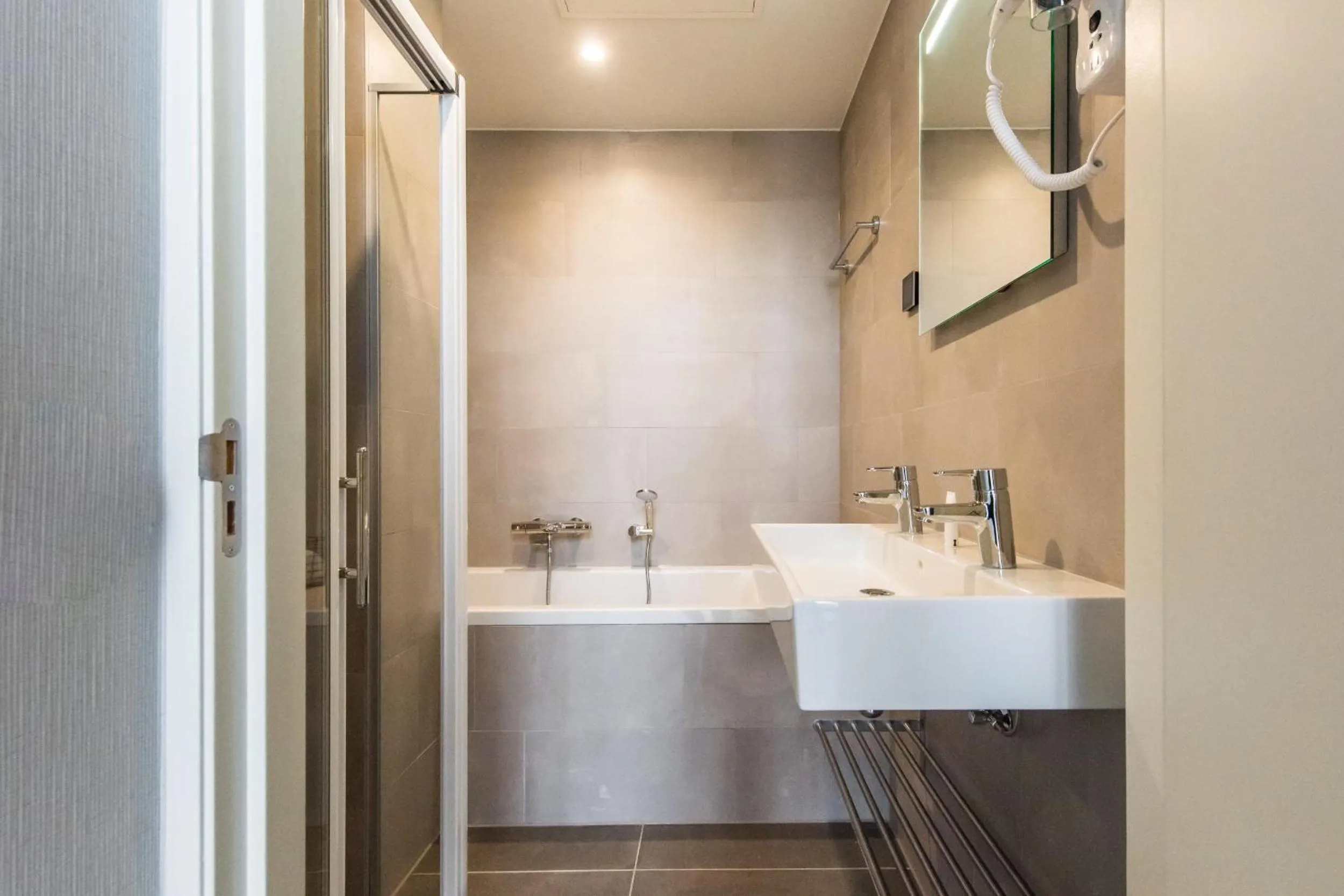 Bathroom in YAYS Amsterdam East by Numa