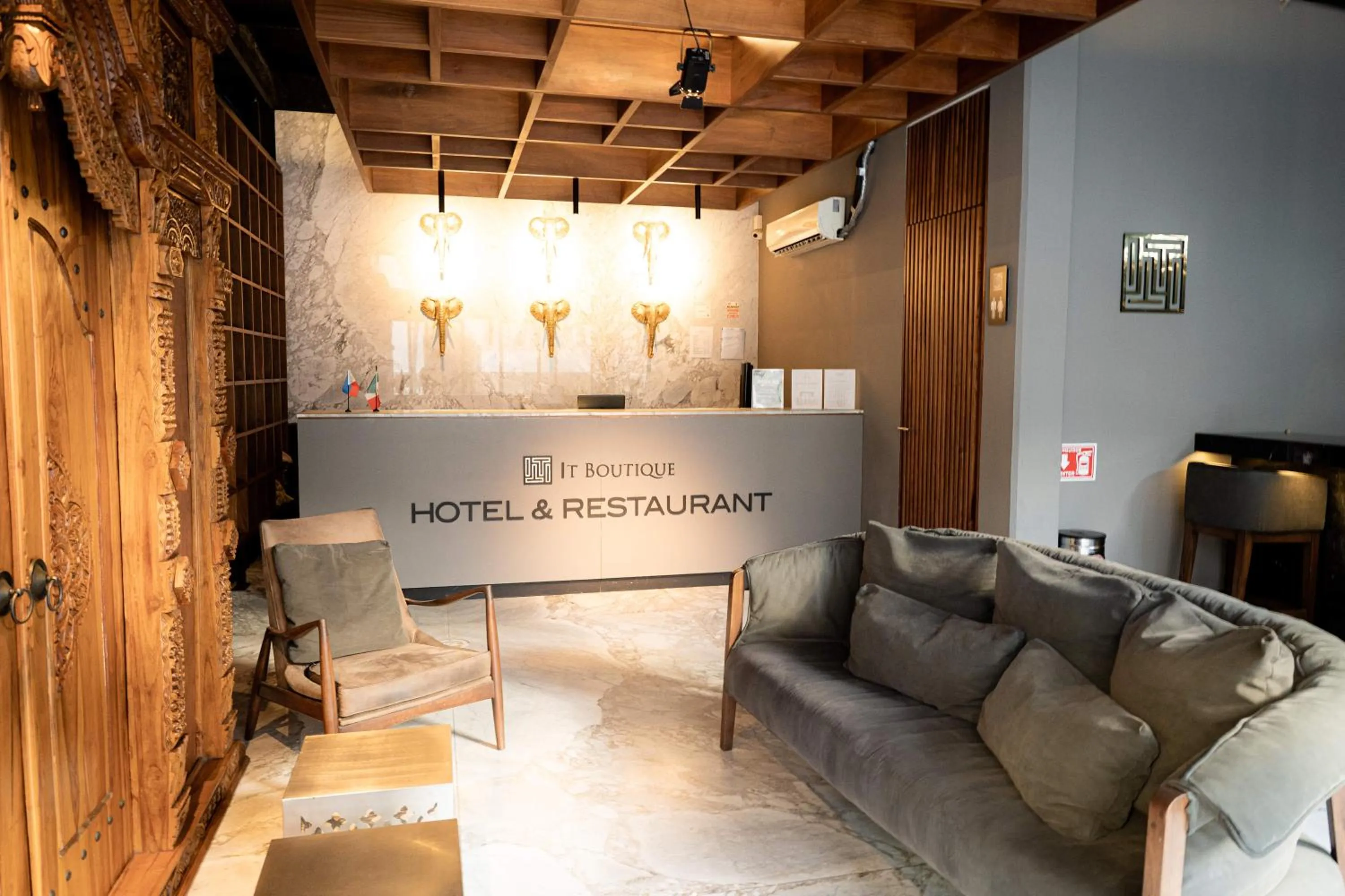 Lobby or reception in IT Boutique Hotel & Restaurant