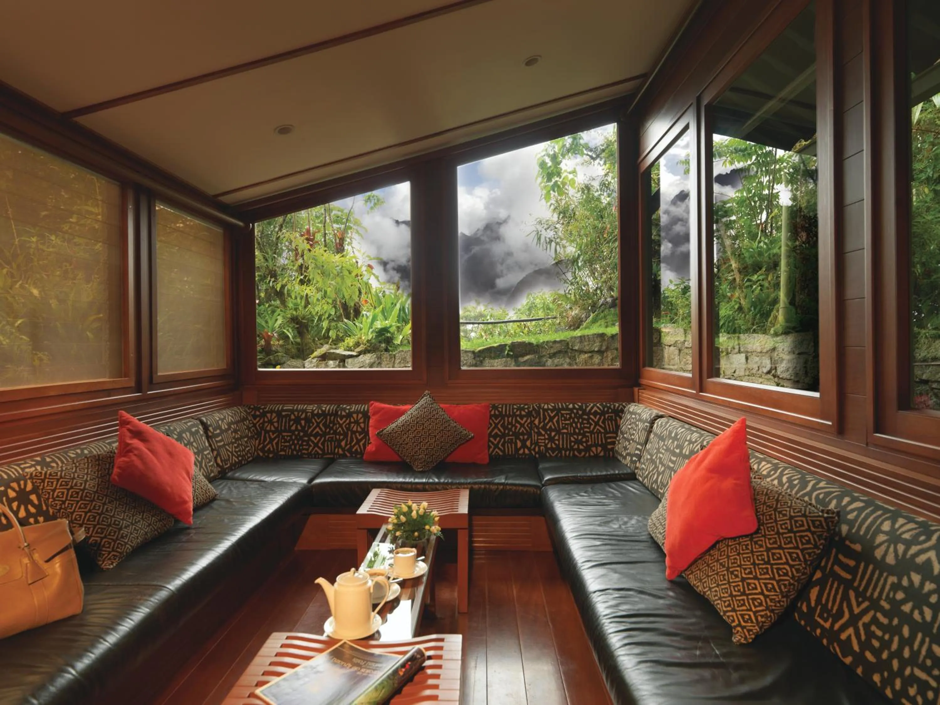 Communal lounge/ TV room in Sanctuary Lodge, A Belmond Hotel, Machu Picchu