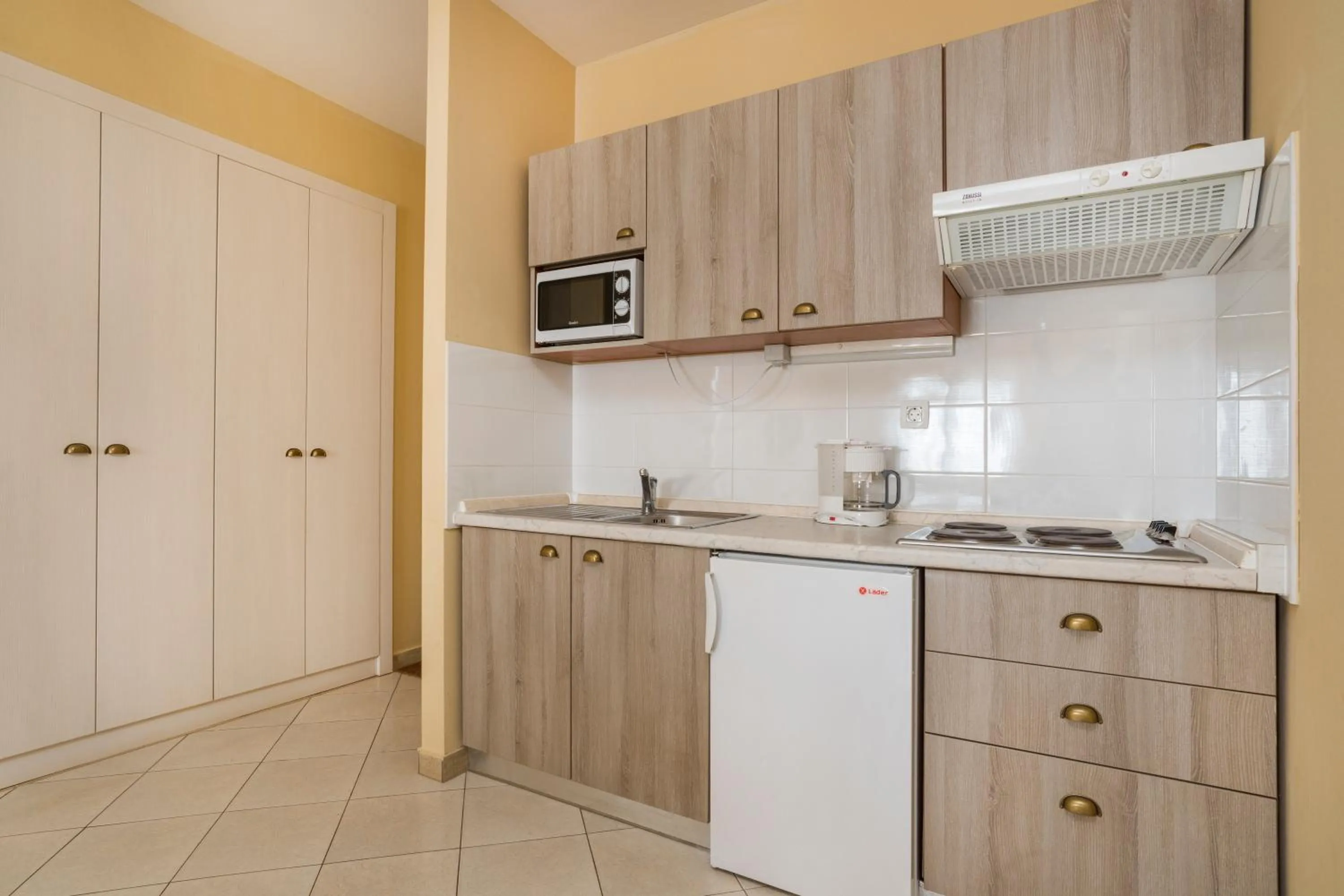 Kitchen or kitchenette in Apartments Amfora Plava Laguna
