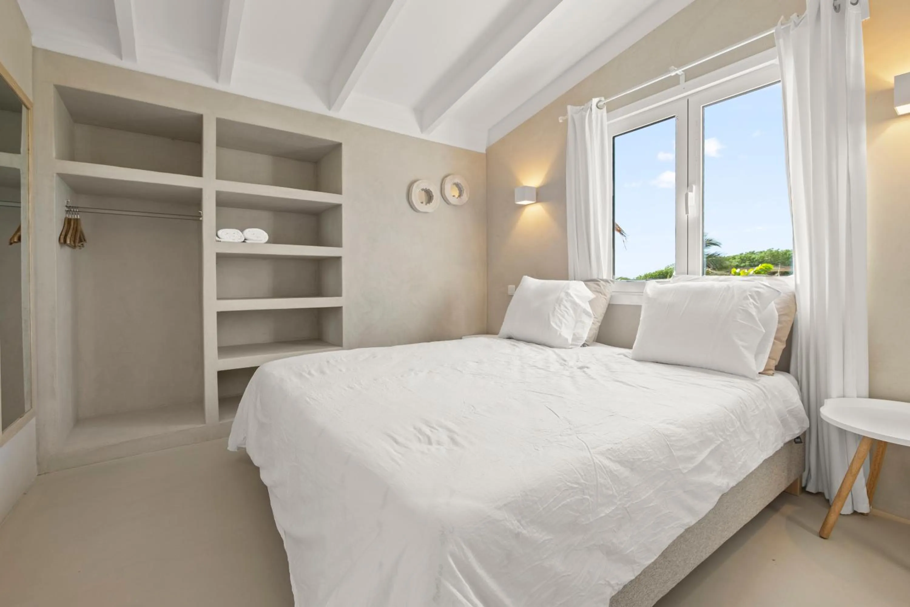 Bed in Sorobon Luxury Beach Resort