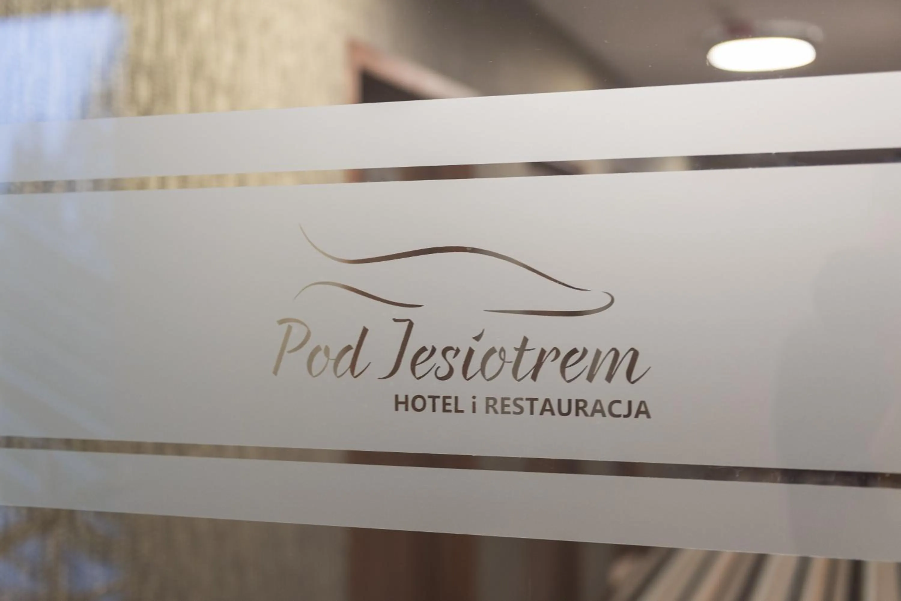 Property logo or sign in Hotel Pod Jesiotrem