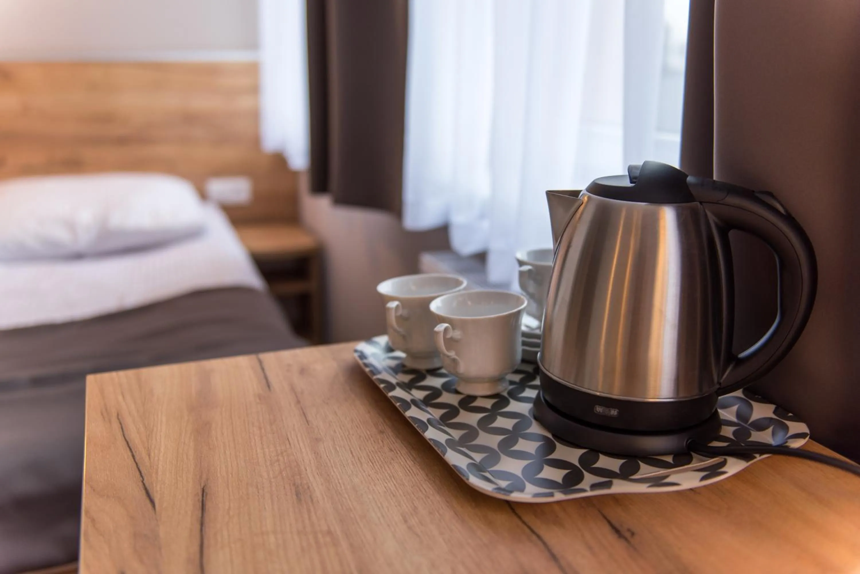 Bed in Hotel Pod Jesiotrem