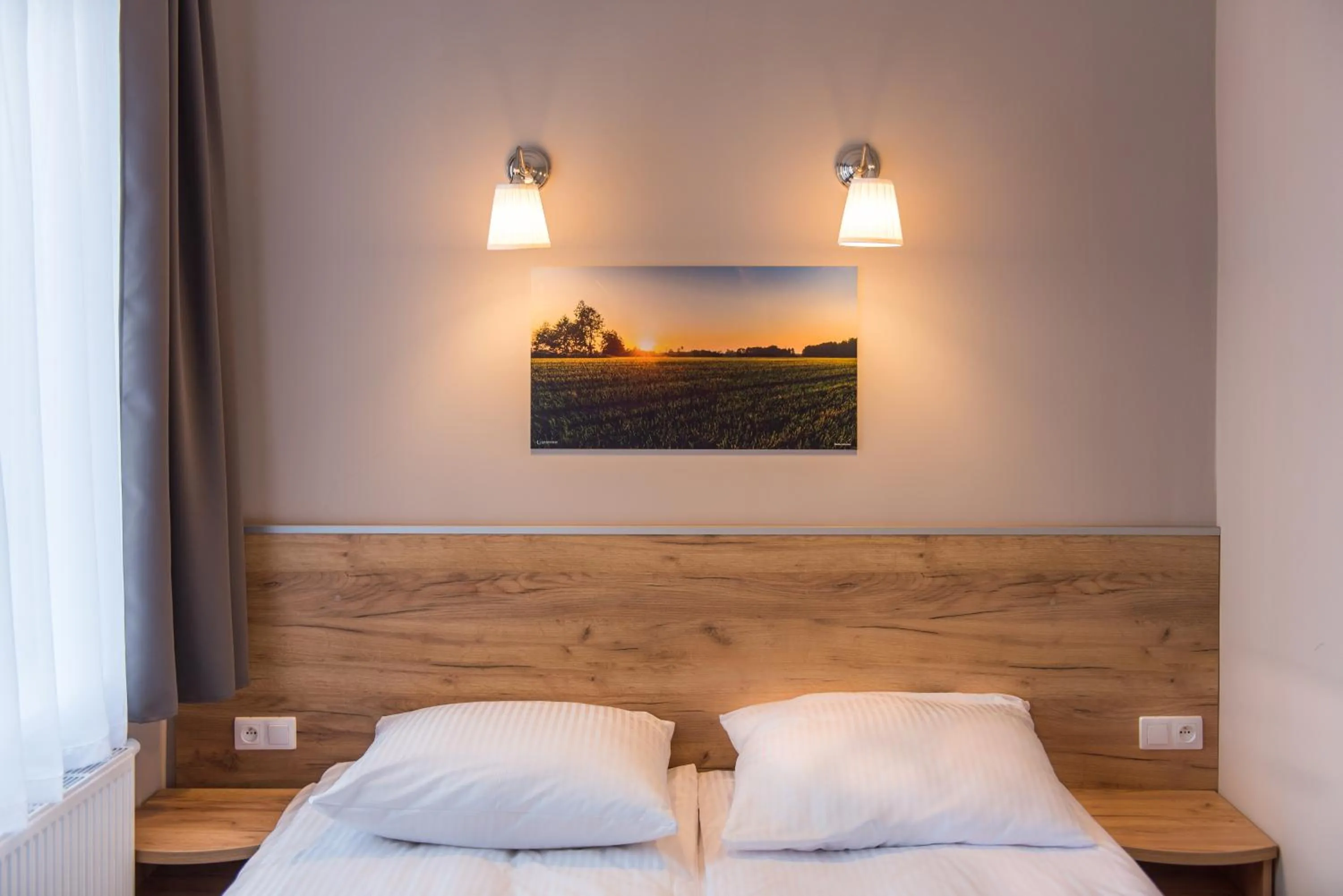 Bed in Hotel Pod Jesiotrem