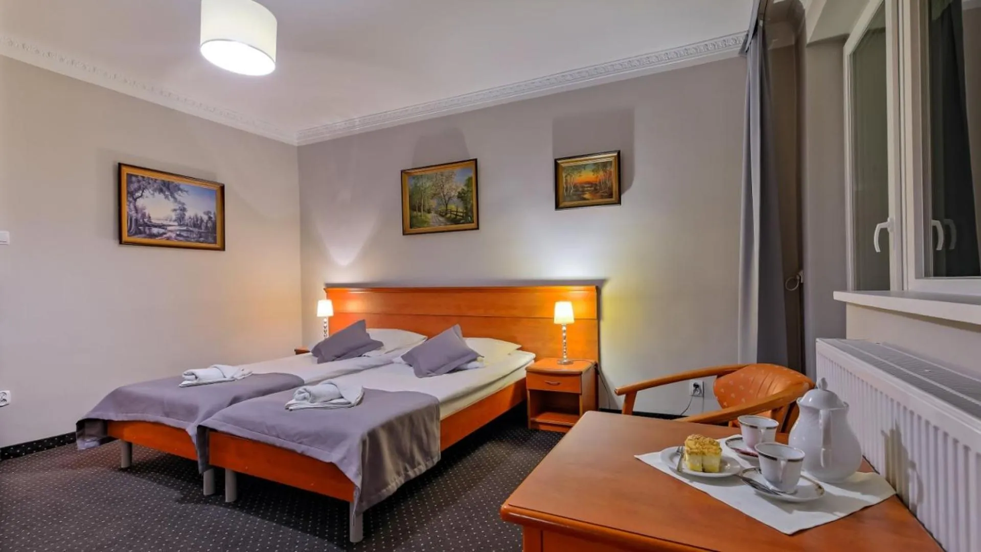 Bed in Hotel Wodnik Twój Hotel z widokiem na morze