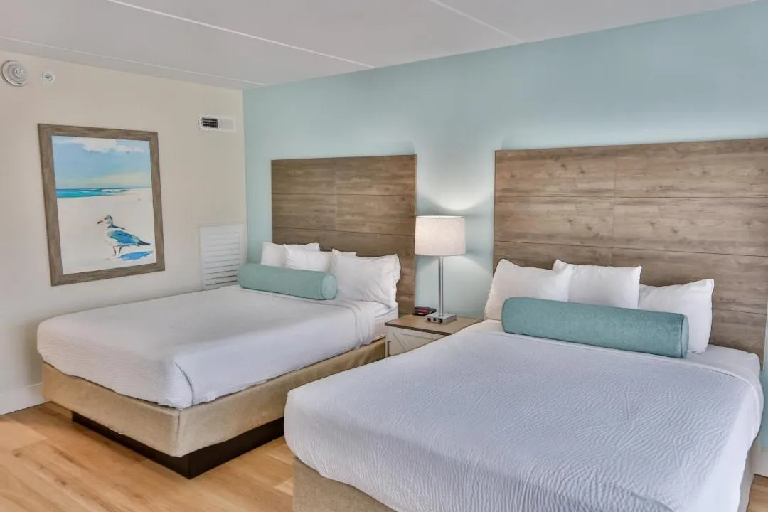 Bed in Princess Royale Oceanfront Resort