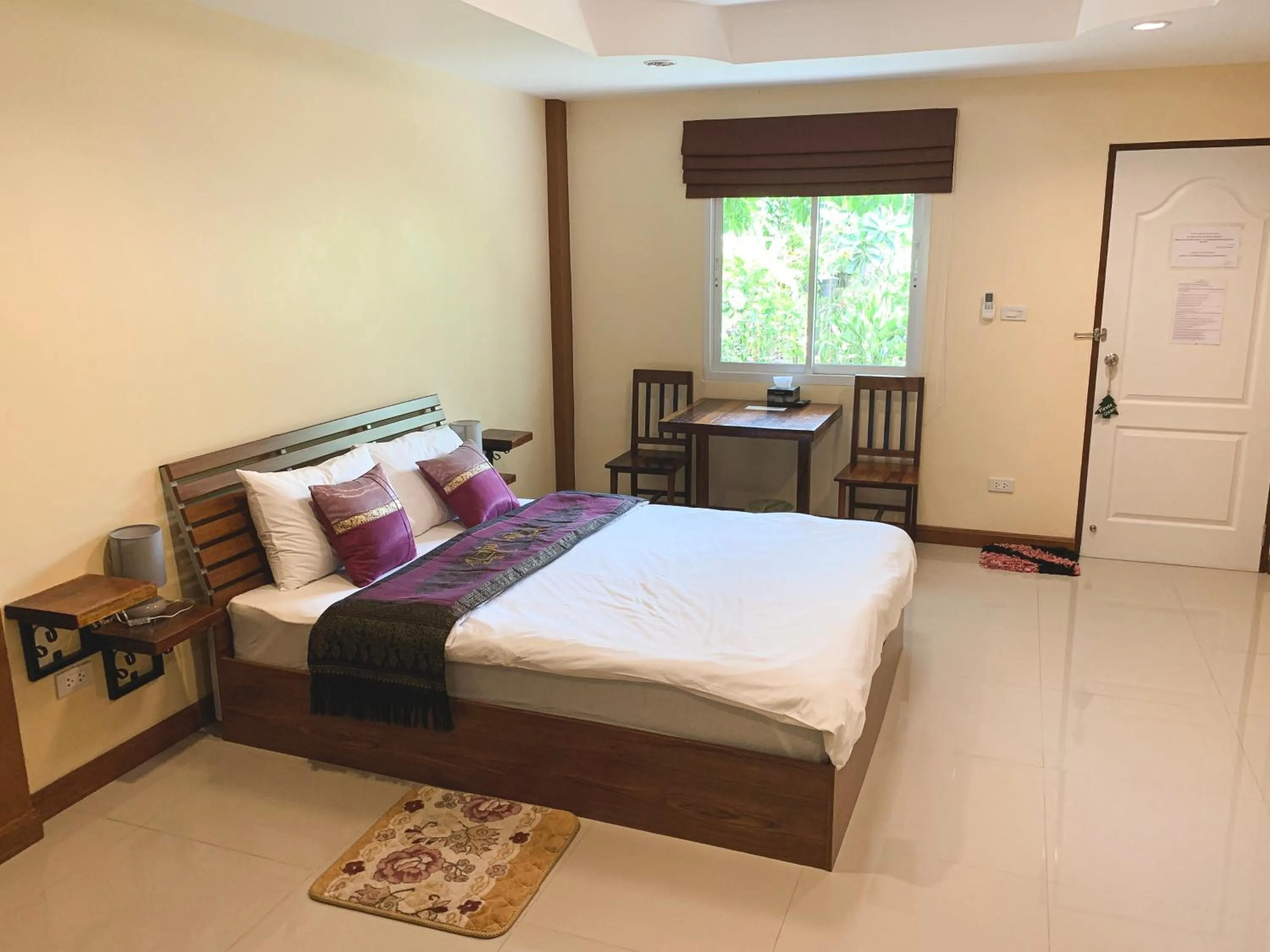 Bed in Baan Sooksiri Bangsaray