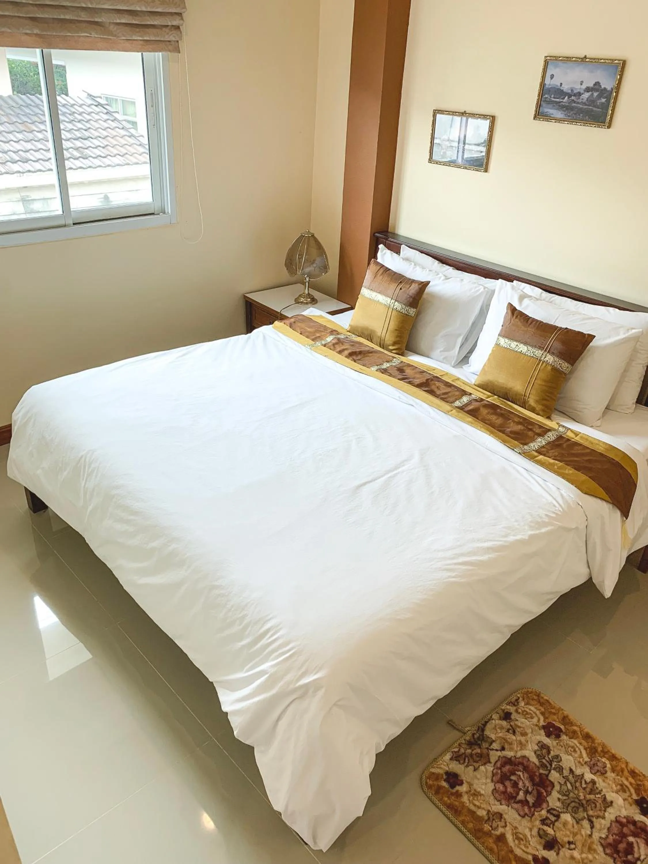 Bed in Baan Sooksiri Bangsaray