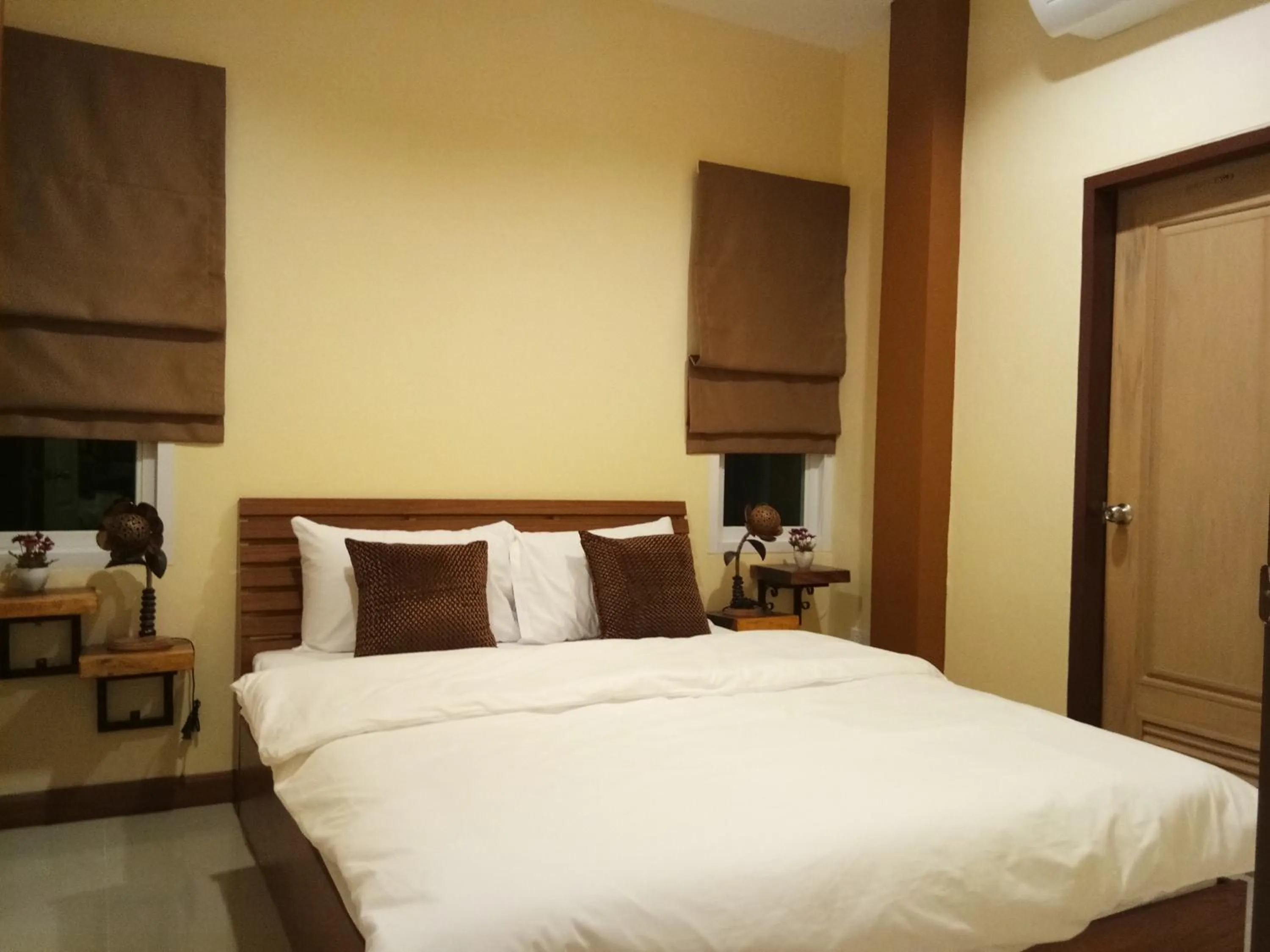 Bed in Baan Sooksiri Bangsaray