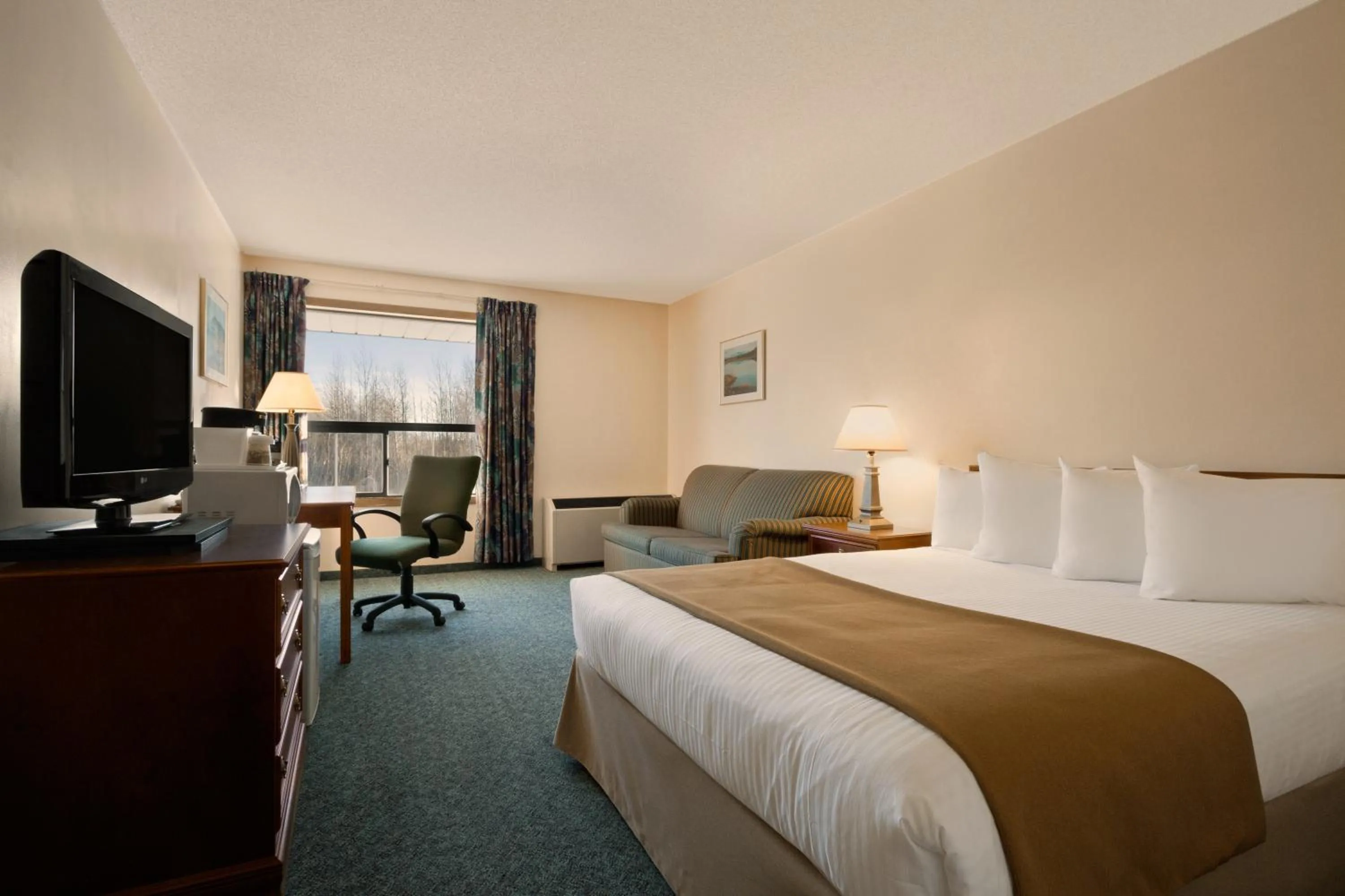 Bed in Northern Star Hotel & Convention Center