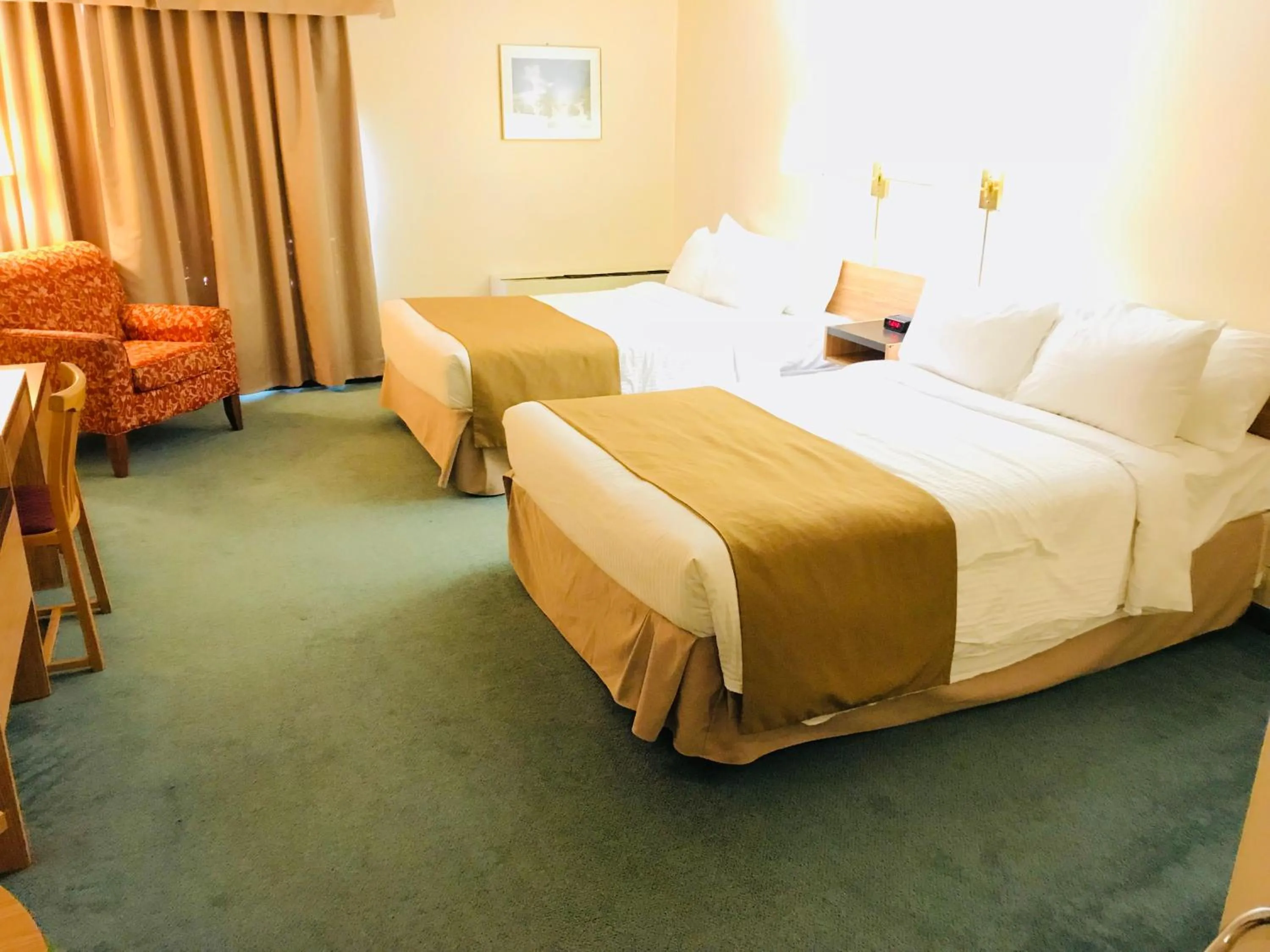 Bed in Northern Star Hotel & Convention Center