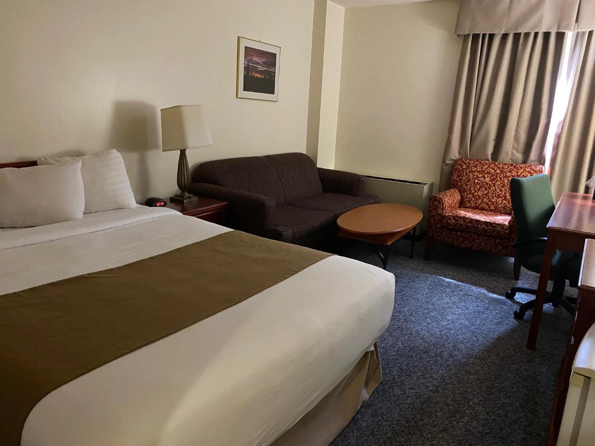 Bed in Northern Star Hotel & Convention Center