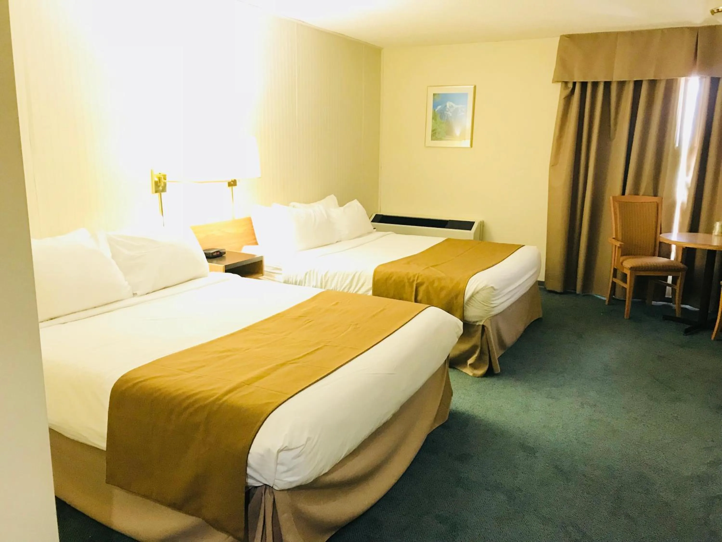 Bed in Northern Star Hotel & Convention Center