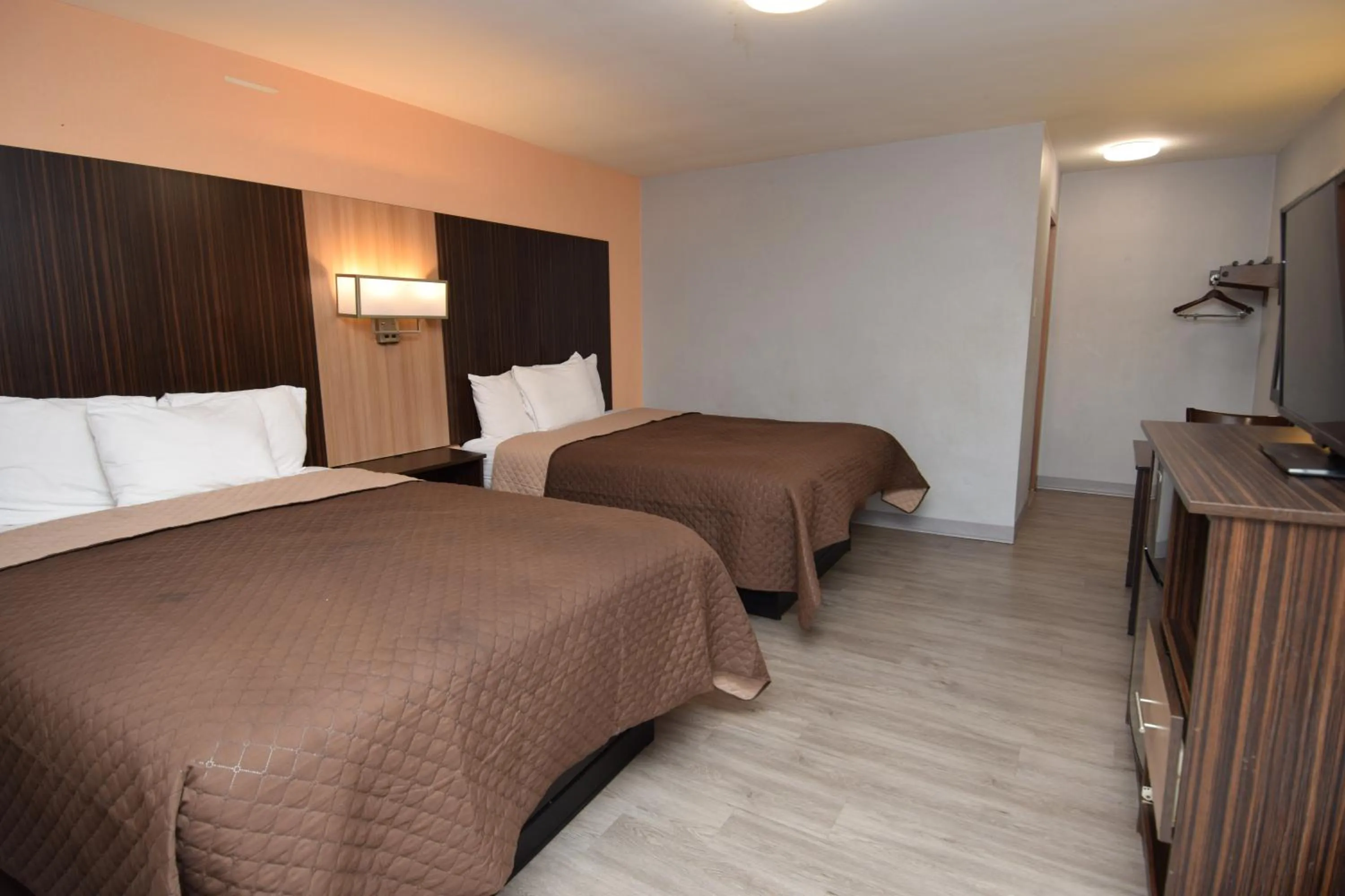 Bed in University Manor Inn