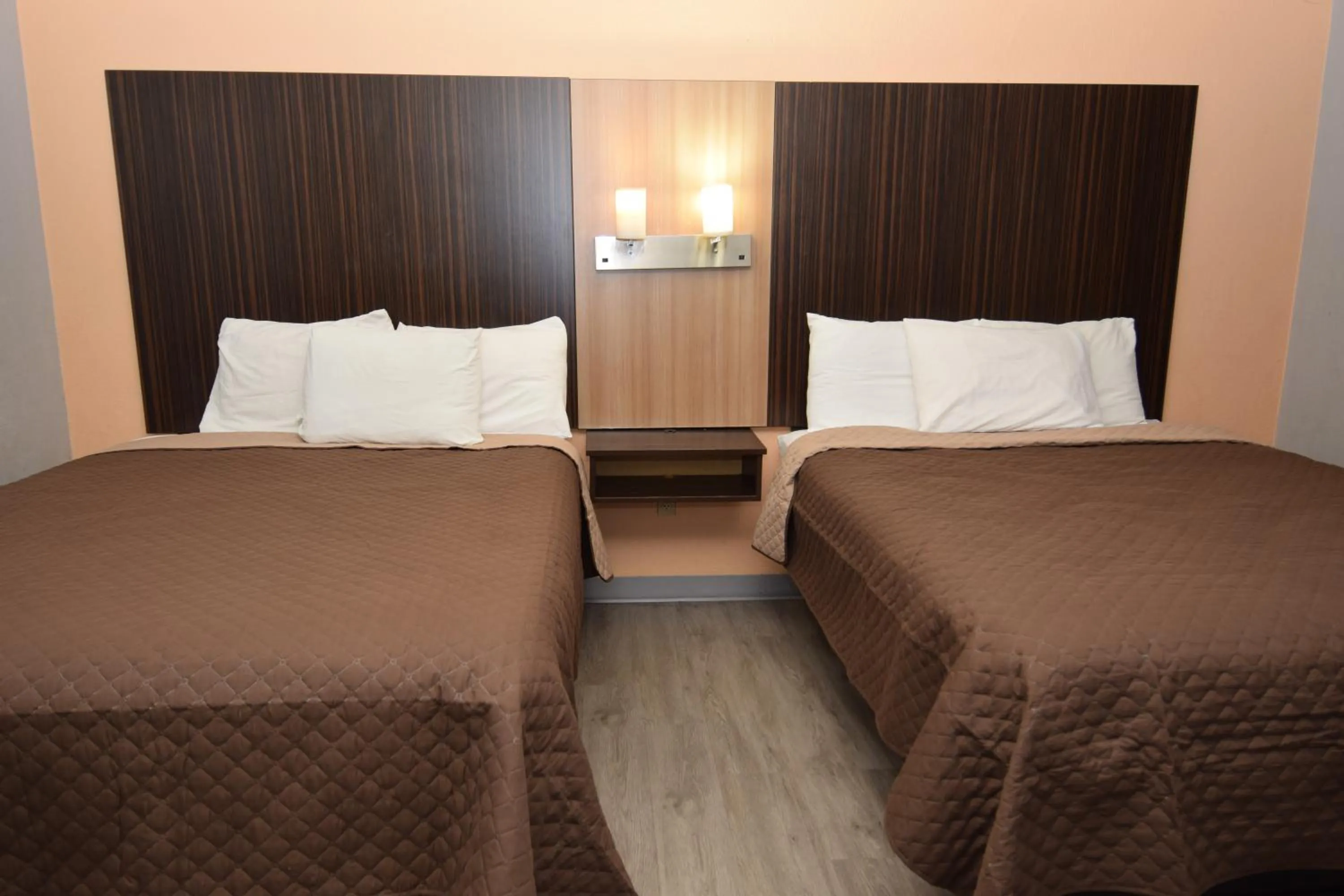 Bed in University Manor Inn