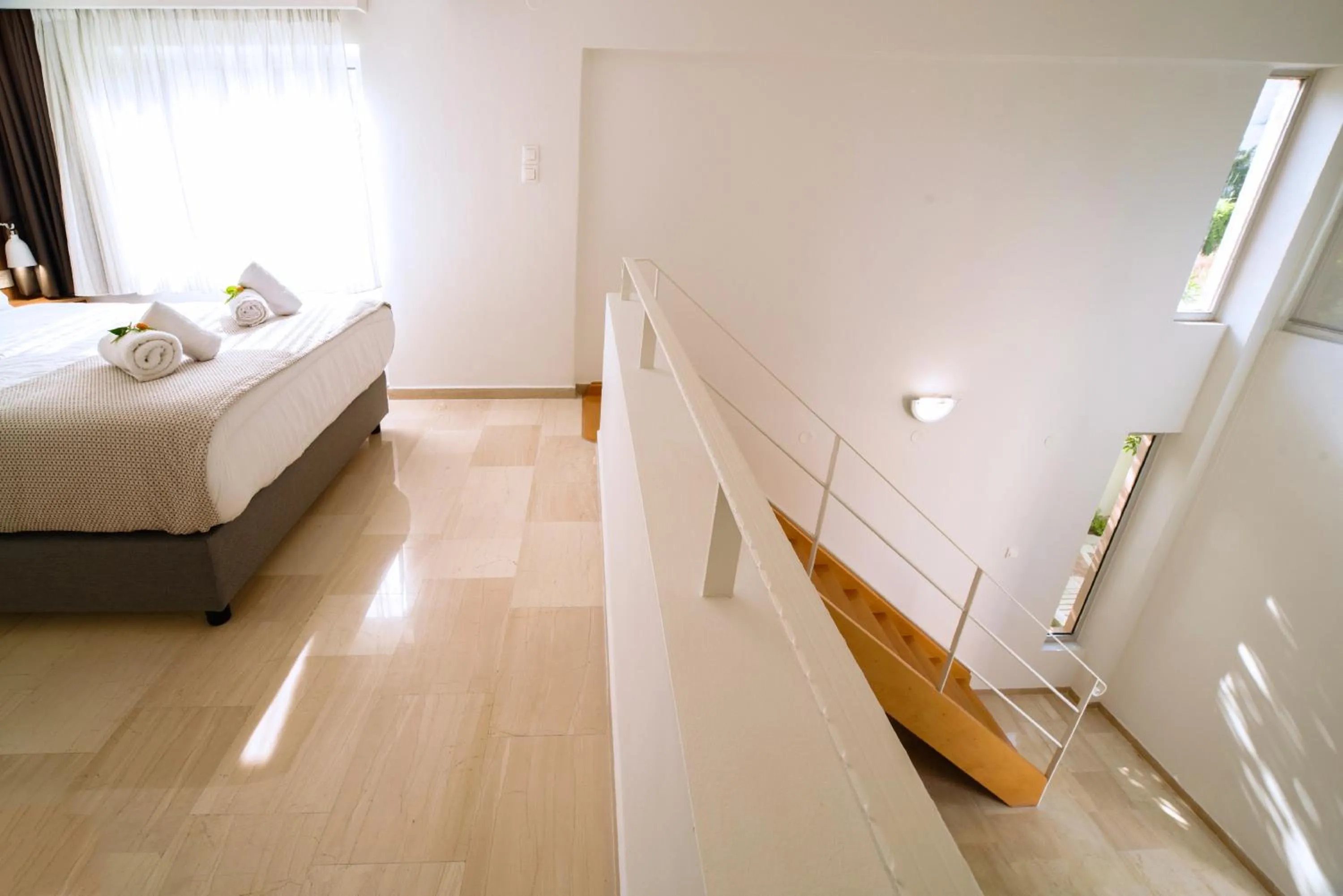 Bed in Lotus Hotel Apartments